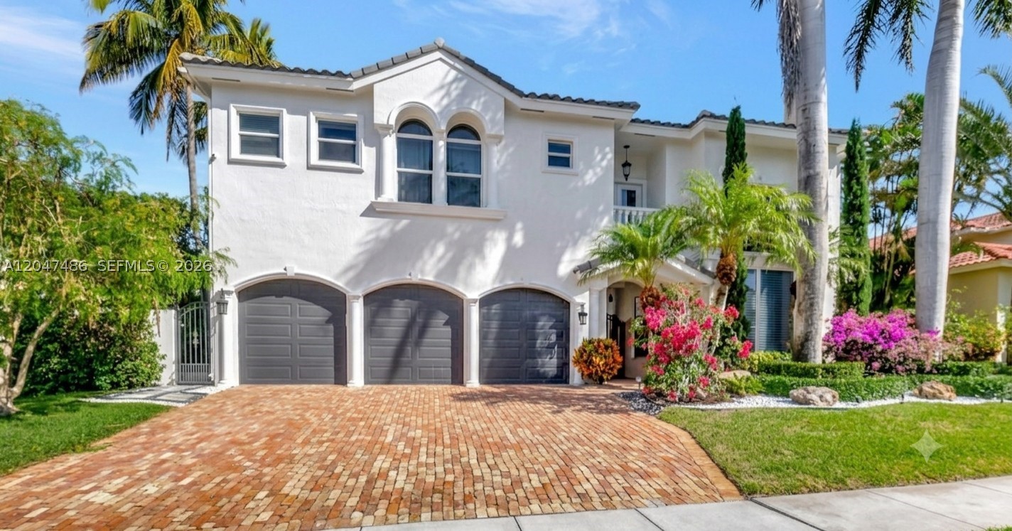 Renovated Mediterranean estate in the exclusive gated community of Boca East Estates, just minutes from downtown Boca Raton's premier restaurants, shopping, and beaches. This inviting residence offers 5 bedrooms, 4 bathrooms, and approximately 3,800* square feet of elegant living space designed for comfort and entertaining. Step through the main entrance into a grand formal living room with soaring ceilings and abundant natural light. The adjoining formal dining room flows into a designer chef's kitchen featuring high-end appliances, dual dishwashers, quartz countertops, extensive cabinetry, and a spacious walk-in pantry; a separate laundry room adds convenience. The kitchen opens to a welcoming family room where French doors lead to a tranquil, private European-style courtyard — an ideal setting for indoor-outdoor living with a custom heated pool and spa, perfect for relaxing or entertaining year-round. A first-floor guest bedroom with cabana bath offers privacy and easy pool access. Upstairs, the expansive primary suite is a true retreat with a sitting area, large walk-in closet, and a spa-inspired bathroom finished with exceptional design details. Three additional bedrooms and two full baths complete the second level, providing ample space for family and guests. An exceptional opportunity to own in one of Boca's most desirable gated communities, moments from everything downtown Boca Raton has to offer. Furniture negotiable. *per Appraisal, sqft under air = 3,766