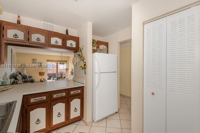 PALM-EAST GARDENS CONDO - Residential