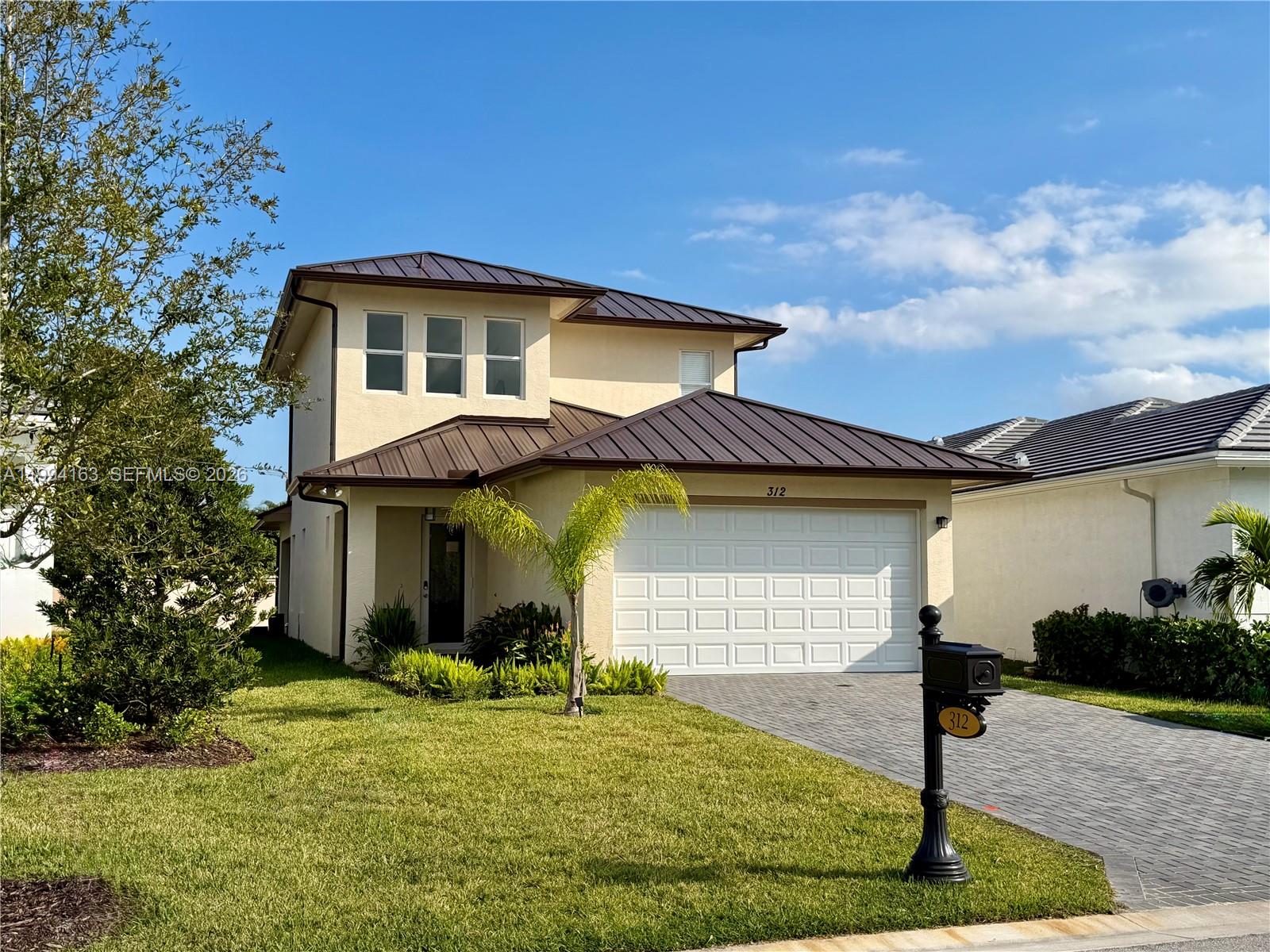 **NEW CONSTRUCTION** Stunning Brand-New 4Bedroom, 3Bathroom Home in the Heart of Port St. Lucie. Discover your dream home in the FL fastest-growing city! This exquisite residence, crafted by The H&R Organization, offers unparalleled modern living. Step inside to elegant white ceramic flooring, high-impact windows, aluminium handrails, two AC units. The stylish kitchen boasts granite countertops and sleek cabinetry, the spacious master suite conveniently located on ground floor features a huge closets. Designed for both beauty and functionality, this home includes, a 2 car garage, expansive front & back yards. Located in a prestigious gated community, you'll enjoy access to a luxurious clubhouse with a pool, gym, tennis court, and more. Don't miss this opportunity to own a brand-new home.