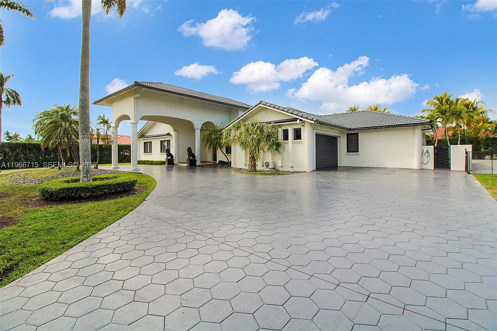 Experience luxury living in this stunning 5-bedroom, 5-bath home, the only residence on the block featuring City Natural Gas. Designed for both comfort and entertainment, this property boasts a breathtaking resort-style pool complete with a cascading waterfall, waterslide, and in-ground pool bar—your private backyard paradise. Elegant marble pavers accentuate the outdoor living areas, creating the perfect setting for gatherings or peaceful relaxation. Inside, spacious living areas, premium finishes, and modern amenities offer the ideal blend of sophistication and functionality. This exceptional home truly stands out as a rare opportunity to own a private retreat with resort-level elegance.