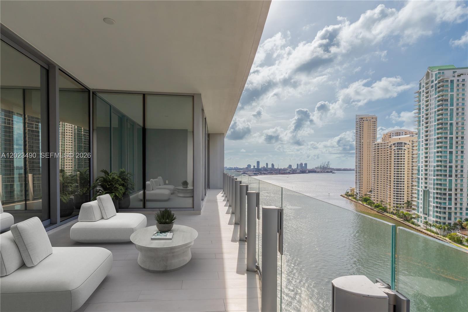Pinnacle of elegance at Aston Martin Residences, where excellence meets high-end living. 4 Suites/Den/En suite Staff Quarters/powder room on 3,225SF of refined interior space, floor-to-ceiling windows & breathtaking views of Biscayne Bay. Interiors adorned w/ Thassos marble flooring, gourmet kitchen w/ Bulthaup cabinetry, Gaggenau appliances & a layout that combines flow, light, & function. 43,000SF of world-class amenities including a marina w/ dockage, Sky-level infinity pool, Spa, indoor pool, gym,2 movie theaters, virtual golf, art gallery, kids’ & teens’ room. Designed w/ Aston Martin’s iconic style, this location offers a blend of urban convenience & waterfront luxury, an unparalleled lifestyle in Miami’s most exclusive new address. Unit is original as delivered by the developer. Pics are virtually designed by UNA Home Design
