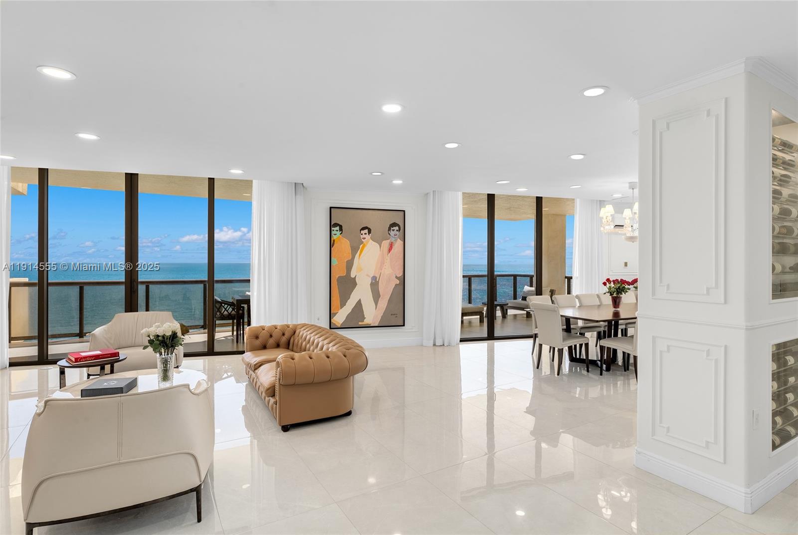 This Upper Penthouse is a beachfront home in the sky, offering 6BR/6.5BA and 4,521 SF of refined living with 4 expansive terraces showcasing panoramic ocean, bay, and city views. Private elevator opens to spacious living and dining areas with an elegant wet bar. Mia Cucina–designed Kosher kitchen sports top-tier Wolf and Sub-Zero appliances. Private principal suite with sitting lobby, spa-style bath, custom walk-in closet, views to Ocean and city. 5 additional bedrooms with full en-suite Italian baths. Custom millwork and Toto toilets throughout. Prime oceanfront location. 5-star amenities