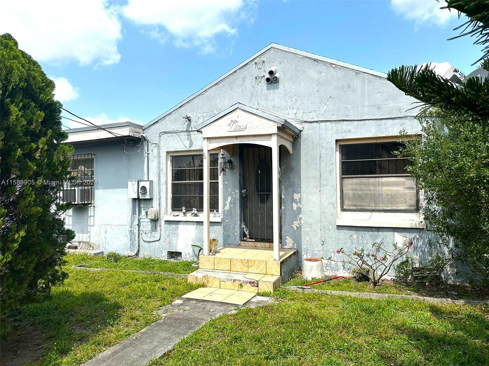 Four beds, two bath main house plus one bed, one bath cottage. Located in an industrial area. Ready to close. Cash only.