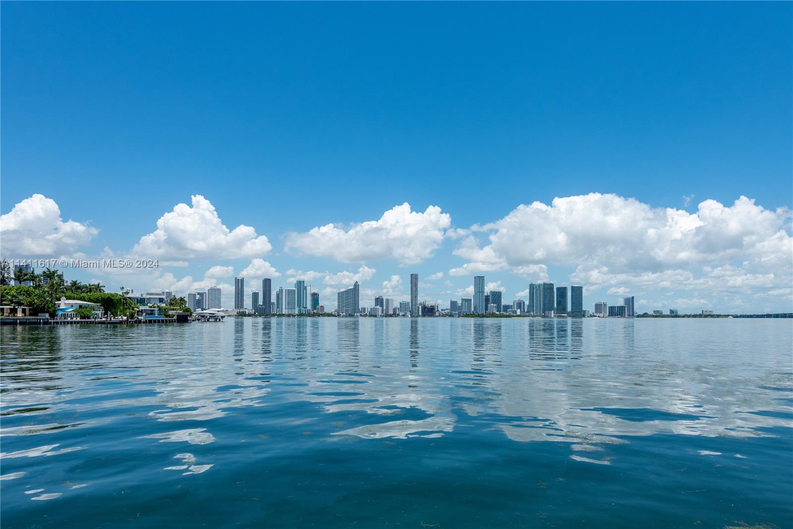 Experience Miami Beach’s waterfront lifestyle from scenic Venetian Islands! This beautifully renovated waterfront home has western exposure and offers serene water views and dreamy sunsets over the Miami skyline! Open floor plan connects the living room, dining area and Boffi kitchen – all offering direct Miami skyline and water views. Family room, full bath, and a large workspace/office complete the first floor. Upstairs, 3 bedrooms, including a master suite with a sitting area and large terrace. The backyard is equipped with a covered patio, built-in cabana, pool, lounge areas.  This gated and lushly landscaped property has 60-FT of waterfront and a dock– ideal for boaters.  Furnished with contemporary furniture, equipped with 2-car A/C garage, driveway. Long-term lease only.