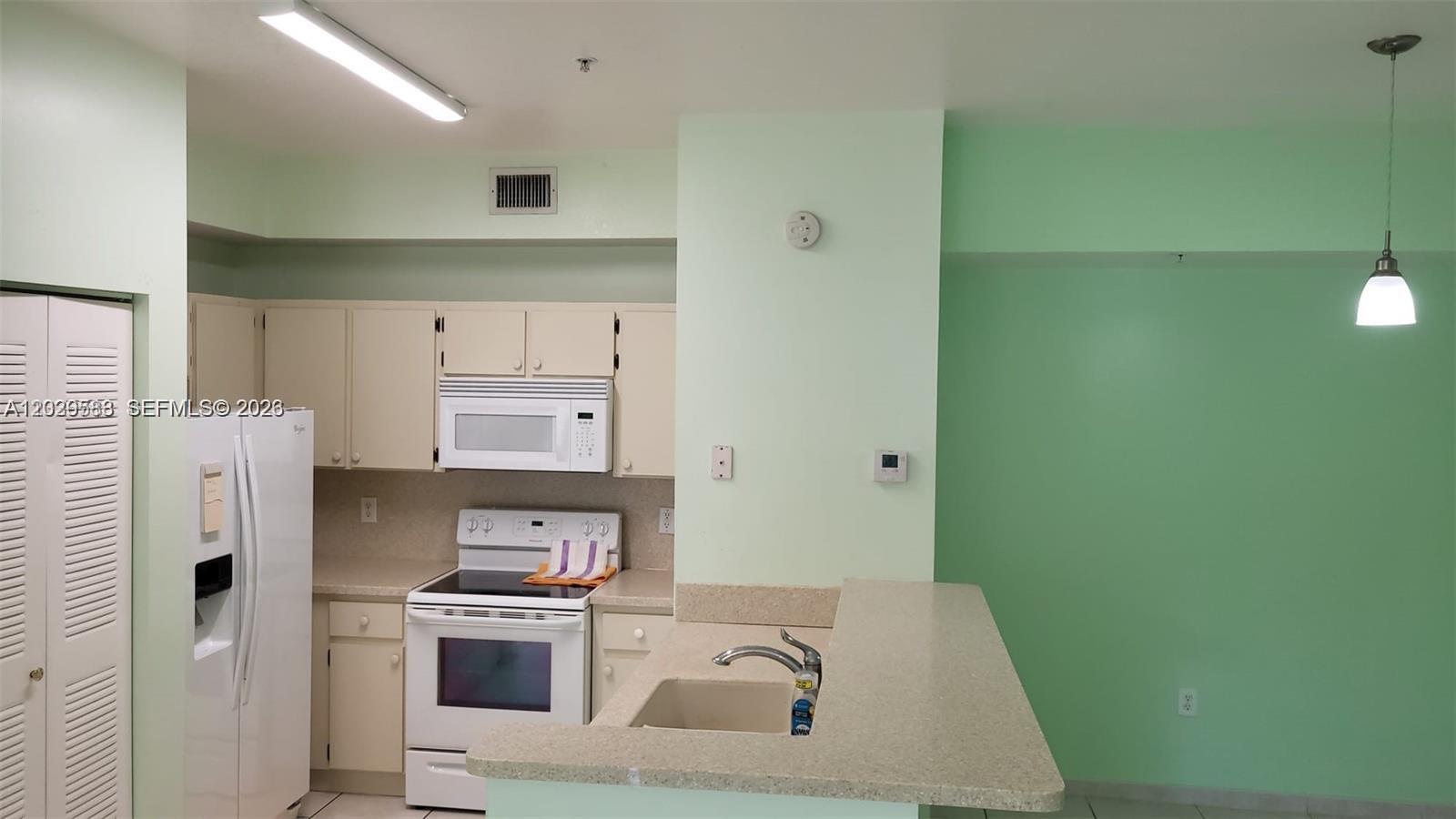 PALM GARDENS AT DORAL CON - Residential