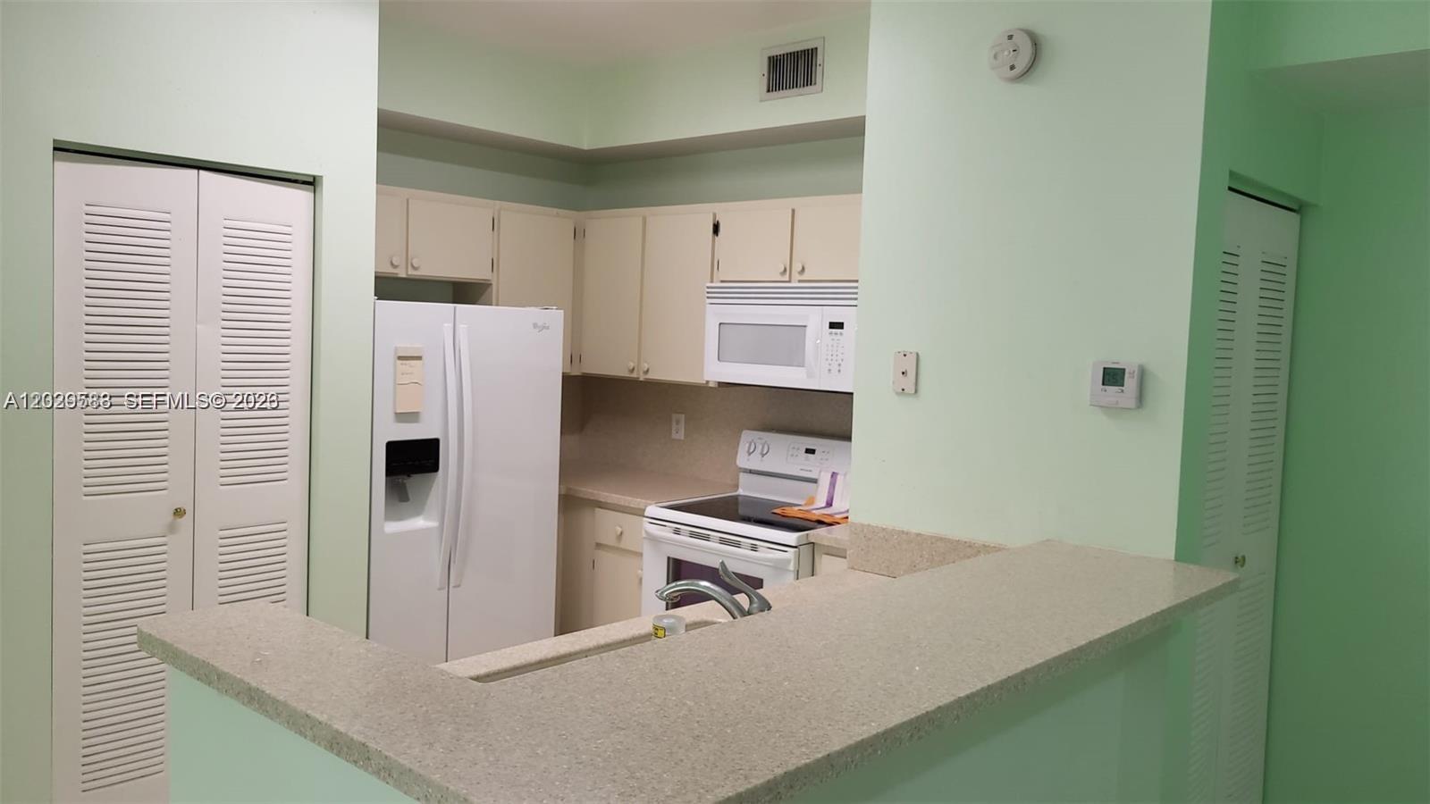 PALM GARDENS AT DORAL CON - Residential