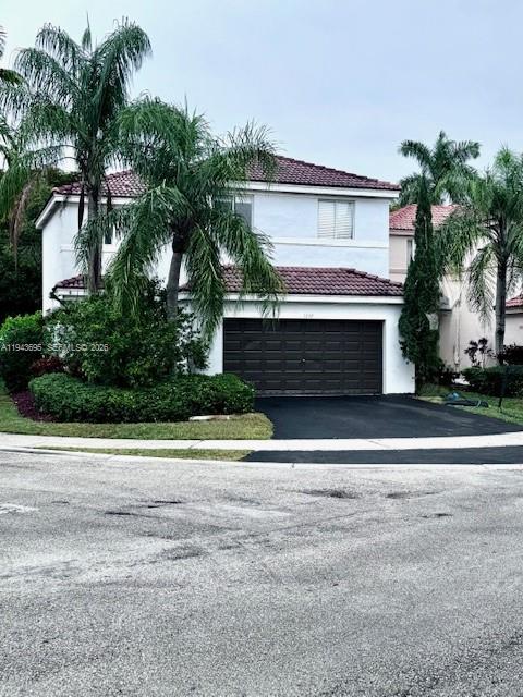 This well-appointed 4-bedroom, 2.5-bath residence offers 1,802 square feet of thoughtfully designed living space in one of Weston's most sought-after gated communities. The kitchen features stainless steel appliances and flows naturally into the main living areas, creating an easy rhythm suited to both quiet evenings and casual entertaining. Neutral tile grounds the downstairs living spaces, while updated flooring upstairs adds a clean, contemporary finish. Natural light moves through the home throughout the day, lending it a warm, airy quality.
Step outside to your own private pool, enclosed within a fenced patio bordered by a lush hedge — a serene retreat with no rear neighbors and complete privacy. The community itself offers resort-caliber amenities, including a clubhouse and five pools, while Weston's top-rated schools, dining, shopping, and highway access place everything within easy reach.
Comfortable, move-in ready, and ideally situated — this home delivers everyday ease in an exceptional setting.