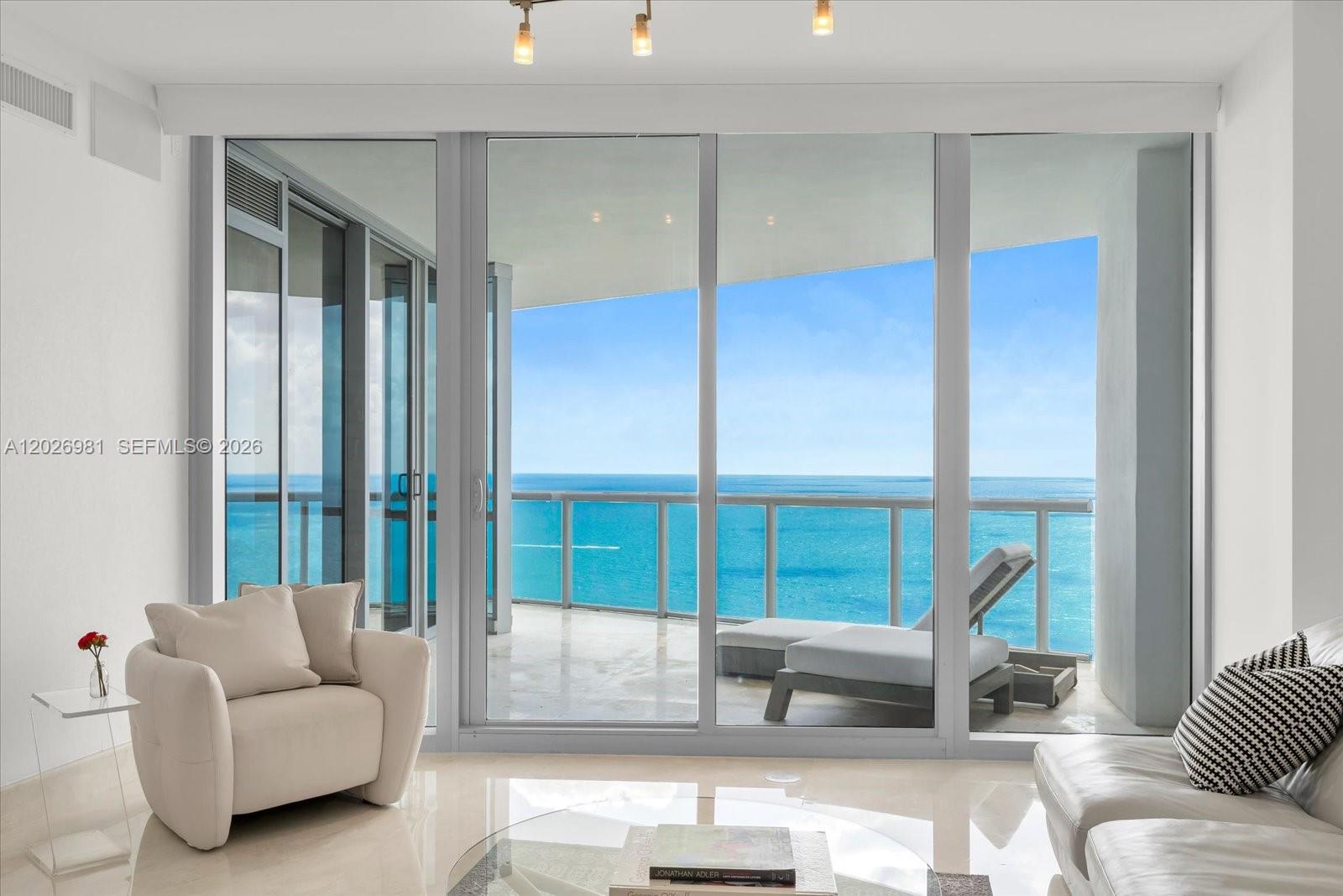 Experience elevated oceanfront living from this spectacular 39th-floor flow-through residence at Jade Ocean. Boasting 3 bedrooms, 3.5 bathrooms, and breathtaking direct ocean views, this sophisticated residence offers floor-to-ceiling glass, expansive sunrise and sunset terraces, and an ideal floor plan designed to capture both the Atlantic Ocean and Intracoastal Waterway vistas.

A private elevator entry welcomes you into bright, open living spaces filled with natural light. The contemporary chef’s kitchen features premium appliances, sleek cabinetry, and a large center island that seamlessly connects to the dining and living areas, creating the perfect setting for entertaining. The spacious primary suite serves as a private retreat with panoramic ocean views, terrace access, a spa-inspired bathroom, and generous closet space. Two additional en-suite bedrooms provide comfort and privacy for family and guests.

Enjoy the ultimate resort-style lifestyle with world-class amenities including oceanfront pools, beach service, fitness center, spa, concierge, valet, and 24-hour security. Ideally located in the heart of Sunny Isles Beach, just minutes from Bal Harbour Shops, Aventura Mall, fine dining, and international airports.

A rare opportunity to own a high-floor direct oceanfront residence in one of Sunny Isles Beach’s most sought-after luxury towers. Luxury, privacy, and endless ocean views await.