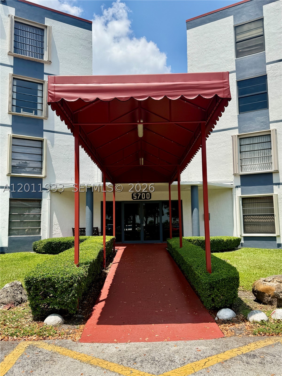 Welcome to Miller Gardens, a private gated community in Kendall Lakes ideally located in highly desirable West Kendall. This top-floor 2-bedroom, 2-bathroom split-plan condo features a spacious layout with high ceilings and abundant natural light, offering an excellent opportunity for buyers looking to renovate and customize to their own taste. The unit includes a large private balcony, hook up for washer and dryer, and accordion storm shutters throughout, as well as ample storage with generous closet space, including walk-in closets. With plenty of potential, it’s ideal for investors or homeowners ready to add value and create their dream space. Residents enjoy a resort-style lifestyle with amenities including two swimming pools, tennis courts, and beautifully maintained tropical landscaping. The property also includes two assigned parking spaces conveniently located near the main entrance of Building 5700. Miller Gardens offers 24-hour gated security with a guard at the gate and roaming patrol, as well as on-site management. The community has been recently updated with fresh exterior paint and new roofs, enhancing both appearance and long-term value. Whether you’re seeking a primary residence or an investment property, this home presents an outstanding opportunity to own in one of West Kendall’s most sought-after gated communities.