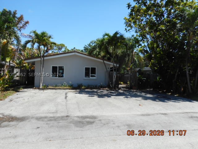Being sold "AS-IS" "WHERE IS". Located in the highly desired Wilton Manor area.  Great for an investment or perfect owner situation to live in one unit and rent the other unit. Six years ago the property went through extensive renovations such as a new s tile roof, new bathrooms in the rear unit as well as floors, and kitchen. This Duplex's front unit is a 2 bedroom 1 full bath with large living room and dining room area and  galley kitchen. There is a washer and dryer in the unit. The rear unit is a 2 bedroom 2 full baths with a  galley kitchen, large living room and dining room  area  over looking your big backyard and shed, washer and dryer in unit . Huge  60 x125 lot and some impact doors.
