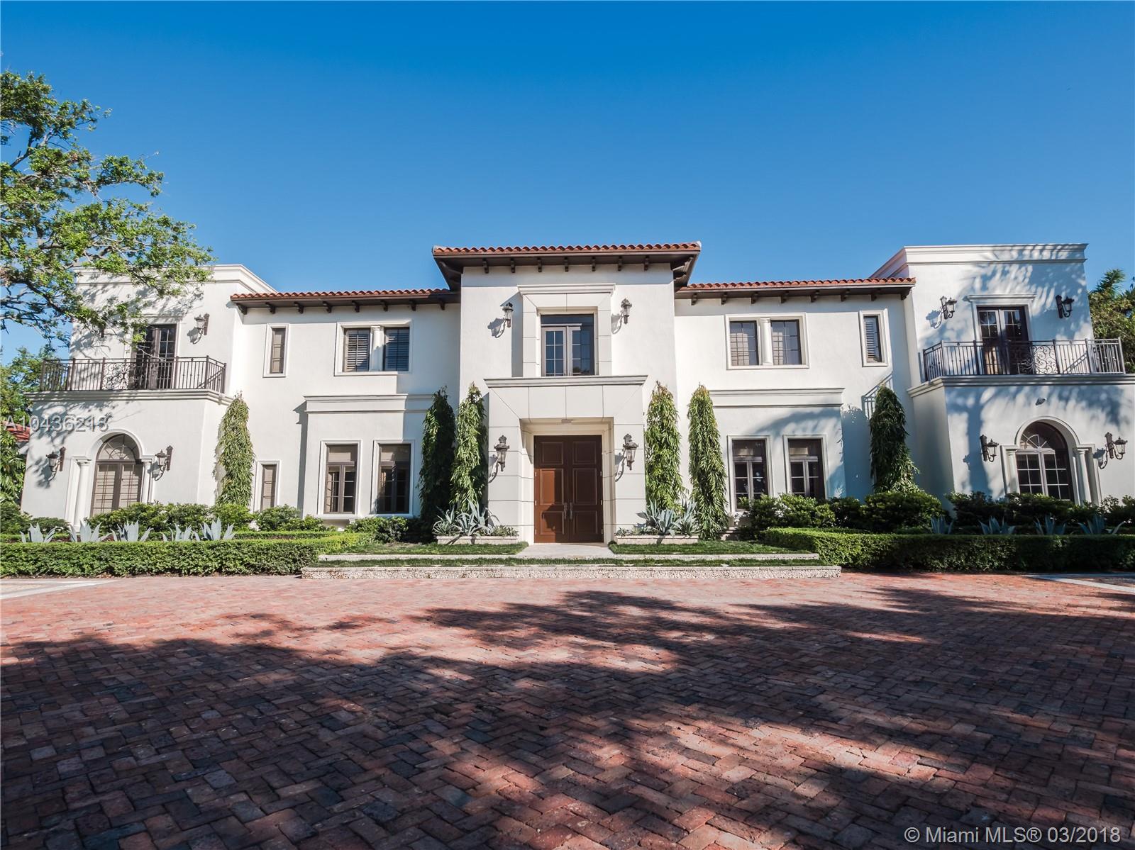 Welcome to living at its finest! This gorgeous estate is move-in-ready and truly has it all. This impressive architectural statement blends modern living and classic luxury. You are greeted in an elegant grand entry. With 8 generous bedrooms, 9 well appointed baths, a chefs kitchen, this home was built to entertain friends and family.  Enjoy Miami's beautiful weather on your own private terraces, relax by the pool and spa, or by the impressive courtyard, with its gazebo, BBQ, and bar. Pick up a game of basketball on the lighted court, or if it’s too hot, take it inside and exercise in the home gym. The kids will never get bored on the in ground trampoline or in the playroom! Other amenities include a custom walk in wine room, master bedroom, glamorous media room and 6 formal gardens.