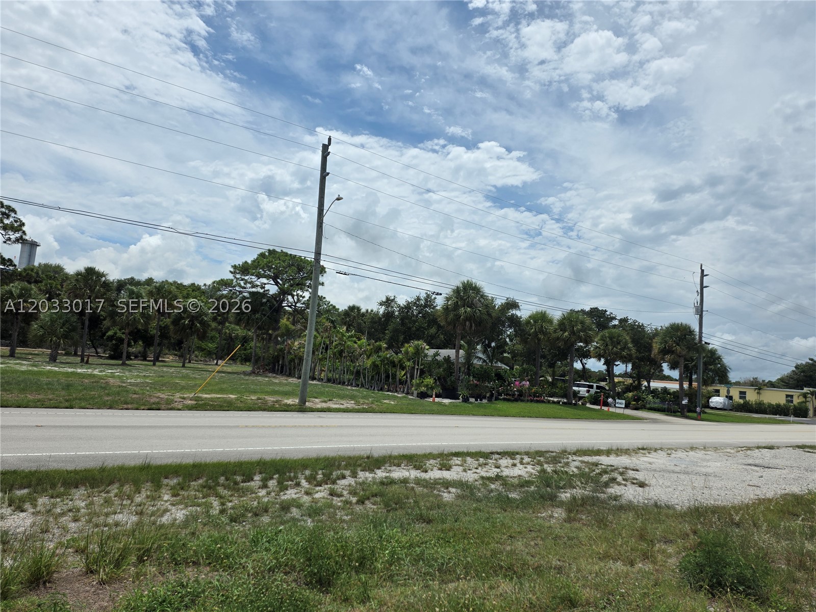 Unique Property. Located on Dixie Hwy south of Bridge Rd. This site is 1 mile from our beautiful Hobe Sound Beach. Downtown is 1/2 mile away. The property surrounding the parcel is now owned by the County of Martin which makes this parcel particularly appealing for a high end multi family development of beween 13 and 14 units. Land USe calls for 15 units to the acre. Infrastructure is very nearly finished! Give a call and see if this opportuntiy works for you!