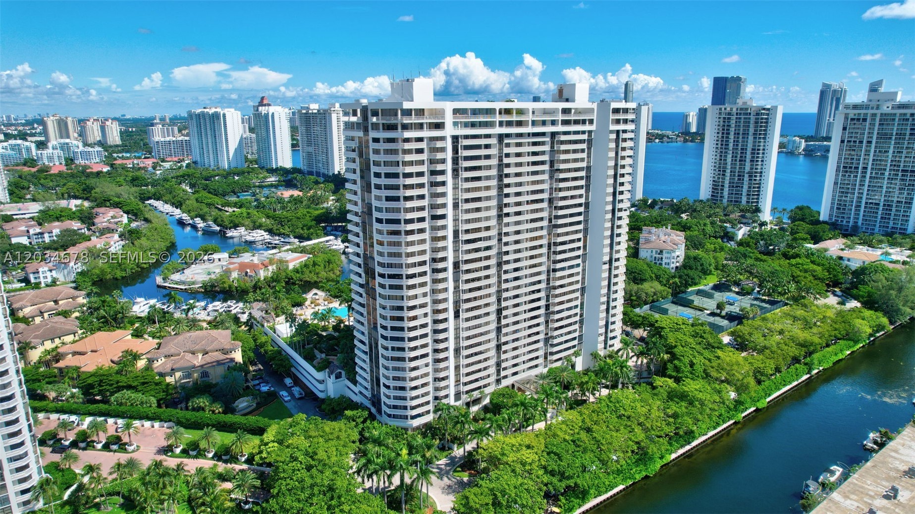 AMAZING OPPORTUNITY & GREAT PRICE - SPACIOUS 2 BEDROOM /2 BATH UNIT IN LUXURIOUS WILLIAMS ISLAND. LIVE IN PRESTIGIOUS WILLIAMS ISLAND WITH FULL AMENITIES:  14 TENNIS COURTS, 4 PICKLE BALL COURTS, 2 PADEL COURTS, 3 RESTAURANTS, STATE OF THE ART SPA, MARINA, WALK/JOG PATH, KIDS PLAYGROUND, BASKETBALL COURT, SOCCER FIELD, PUTTING GREEN, COURTESY BUS, WALK TO HOUSES OF WORSHIP AND SO MUCH MORE....
