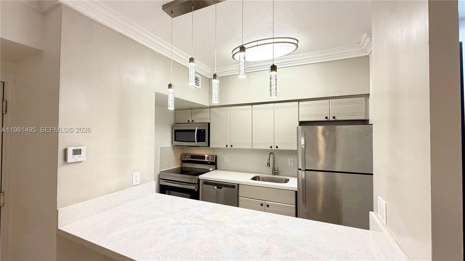 Available immediately, this beautiful top-floor 2-bedroom, 2-bathroom unit in South Beach is full of natural light with a sunny south exposure. The unit was recently repainted and features a gorgeous modern open-concept kitchen with stainless steel appliances and quartz countertops. The split floor plan provides privacy and functionality, whit tile floors and central AC offer comfort throughout. Laundry area is conveniently located on the 1st  floor. Just one block from Lincoln Road, this secured building allows you to enjoy the best of the South Beach lifestyle. Resident street parking available. Short-term rentals are not permitted, making this an ideal long-term home in a prime location. Easy to Show and video tour available.