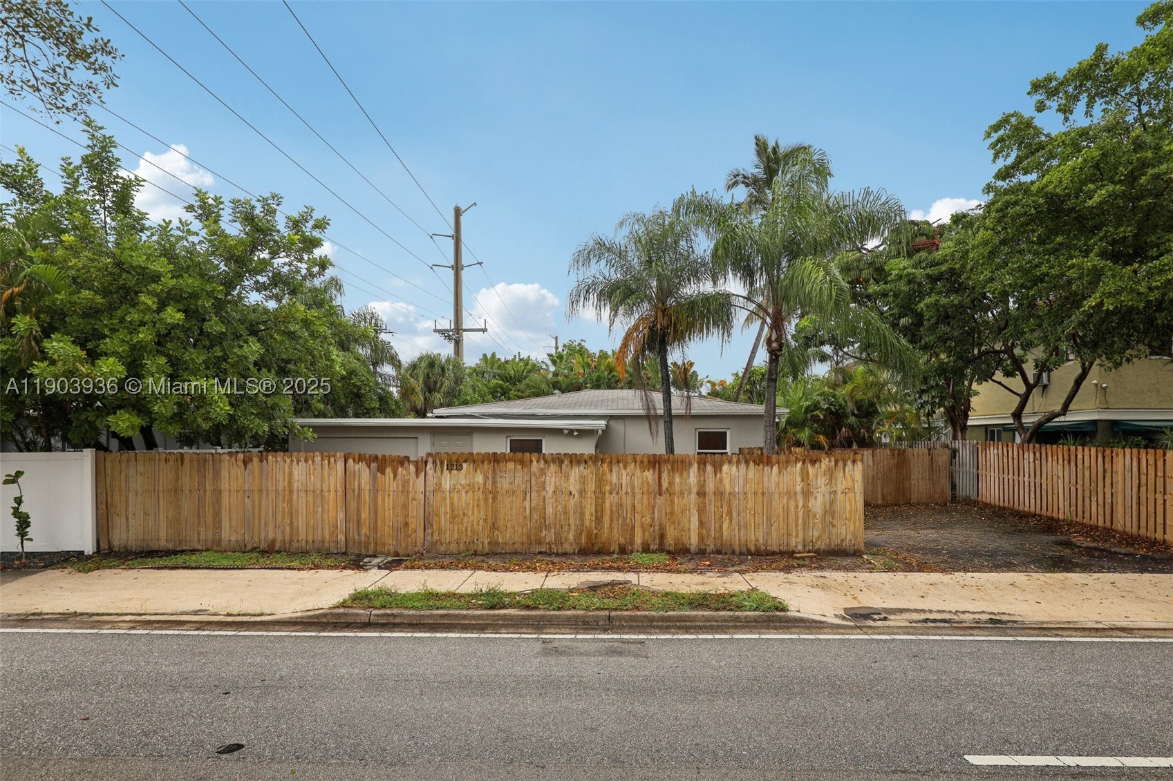 Home is boarded up, so it is being sold as-is. Welcome to this well-maintained 3-bedroom, 2-bath home in the heart of Fort Lauderdale, offering both comfort and convenience. Step inside to find a bright, open living area that flows seamlessly into a modern kitchen with plenty of cabinet and counter space. The split-bedroom layout provides privacy, while the spacious primary suite offers a peaceful retreat. Enjoy outdoor living in the private backyard, perfect for relaxing or entertaining. Located just minutes from beaches, downtown, shopping, dining, and major highways, this home combines a prime location with a welcoming atmosphere — perfect for full-time living or investment.