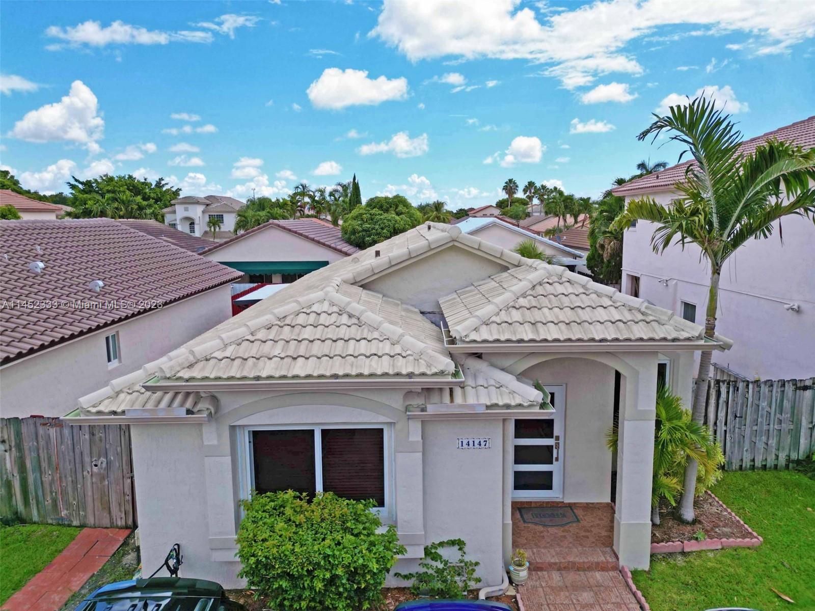 "COZY AND INVITING" is the only way to describe this warm and welcoming 3-bedroom / 2 -bathroom home located in the family friendly community of Brighton's Meadow Trace in west Miami-Dade. This beautiful open concept home features gorgeous floors, a remodeled kitchen, stainless steel appliances, impact windows and doors and so much more. Additionally, this property has a large screened in covered patio and a separate utility room for the washer and dryer. This home is Move-In-Ready to enjoy with family and friends throughout the entire year.