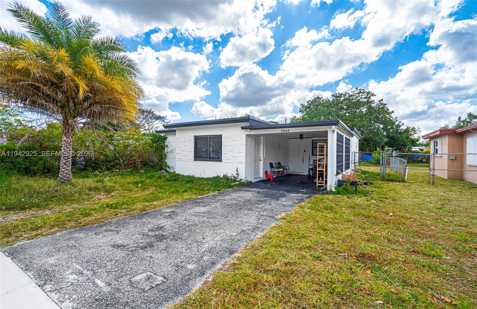 Welcome to this inviting residence ideally located in a quiet, established Hollywood neighborhood. 5844 Garfield Street offers a wonderful opportunity to enjoy South Florida living with convenient access to local schools, parks, shopping, dining, and major roadways. The home features a functional layout with comfortable living spaces, ideal for everyday living and entertaining. Enjoy the outdoor area with room to relax, garden, or customize to your lifestyle. Whether you’re a first-time buyer, growing household, or investor, this property offers great potential in a desirable location just minutes from beaches, downtown Hollywood, and Fort Lauderdale. Don’t miss the chance to make this home your own.