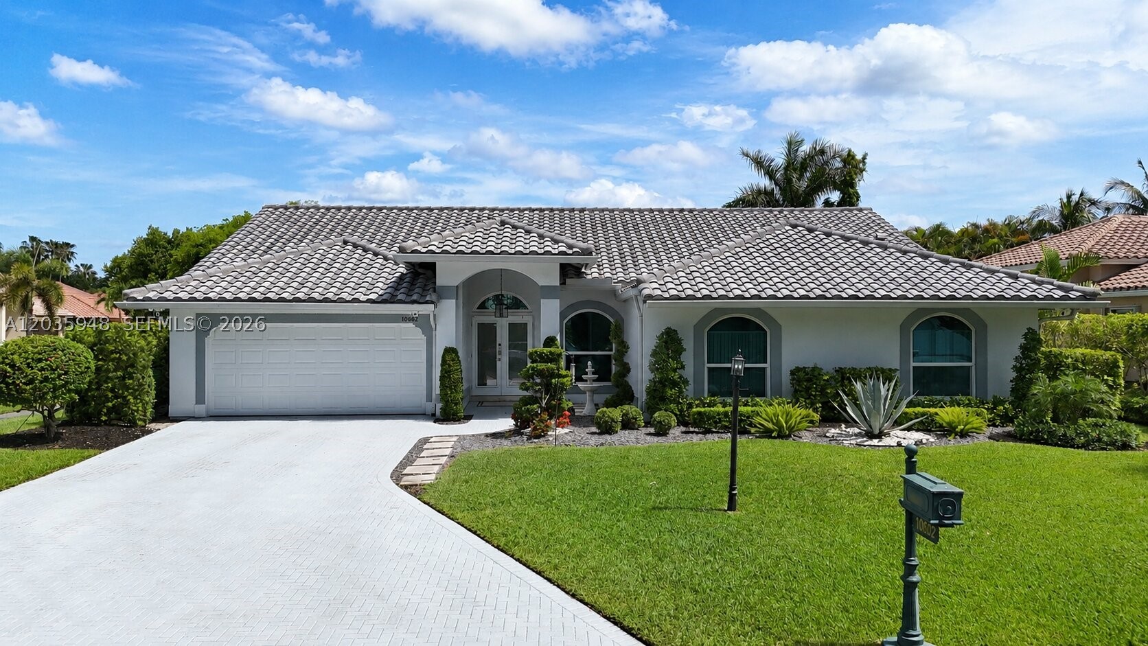 Welcome to this beautifully remodeled 4-bedroom, 2-bathroom home situated on an impressive oversized corner lot in one of Coral Springs’ most desirable neighborhoods. Featuring a highly functional split-bedroom floor plan, spacious two-car garage, spacious driveway, and exceptional curb appeal, this move-in-ready residence offers the perfect blend of luxury, comfort, and outdoor living.

Inside, you’ll find custom window treatments throughout and a recently resurfaced kitchen with a charming breakfast nook overlooking the patio- perfect for enjoying morning coffee or family meals. The stunning primary suite boasts a spa-inspired bathroom complete with a soaking tub and oversized walk-in shower. The beautifully appointed laundry room features a new washer and dryer, utility sink, decorative backsplash, custom cabinetry, and abundant storage. Complete with high grade impact windows, doors and garage door, top of the line appliances, and a 2010 barrel tile roof.

Step outside to your private backyard oasis with a sparkling pool with heater, covered lounge area, lush landscaping, and elegant landscape lighting that creates a breathtaking nighttime ambiance. The expansive lot provides ample space for entertaining, play, and enjoying South Florida’s year-round outdoor lifestyle. 

Ideally located near top-rated schools, parks, shopping, dining, and just moments from Parkland, this exceptional home offers the best of South Florida living.