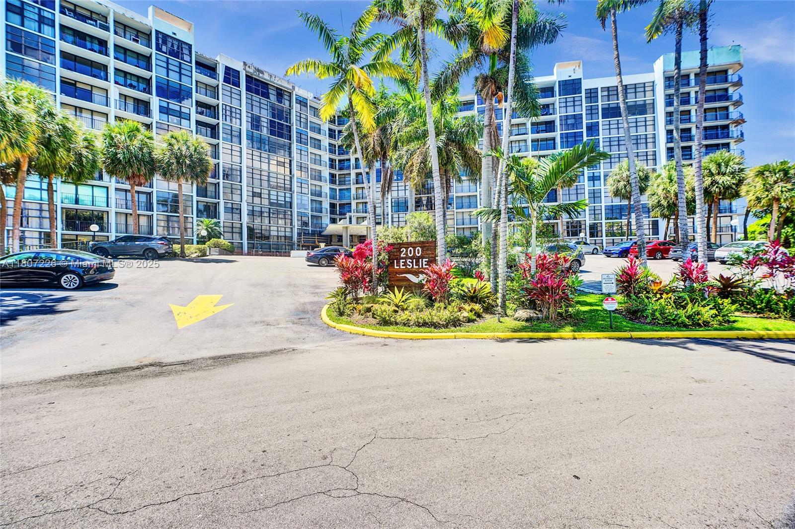Stunning corner unit at 200 Leslie offers 3 spacious bedrooms, 2 full baths, and an open-concept layout with floor-to-ceiling windows showcasing panoramic views of the Intracoastal, skyline and marina. Enjoy seamless indoor-outdoor living with a large wrap-around balcony perfect for entertaining or relaxing. The building features resort-style amenities including a heated pool, tennis court, sauna, gym, BBQ area, and waterfront dining spaces. Additional conveniences include 24-hour valet, security, bike storage, and 2 assigned parking spaces. In-unit washer  add to the comfort of this exceptional residence. Ideally located just minutes from the beach, fine dining, and shopping. A rare opportunity to experience South Florida living at its best.