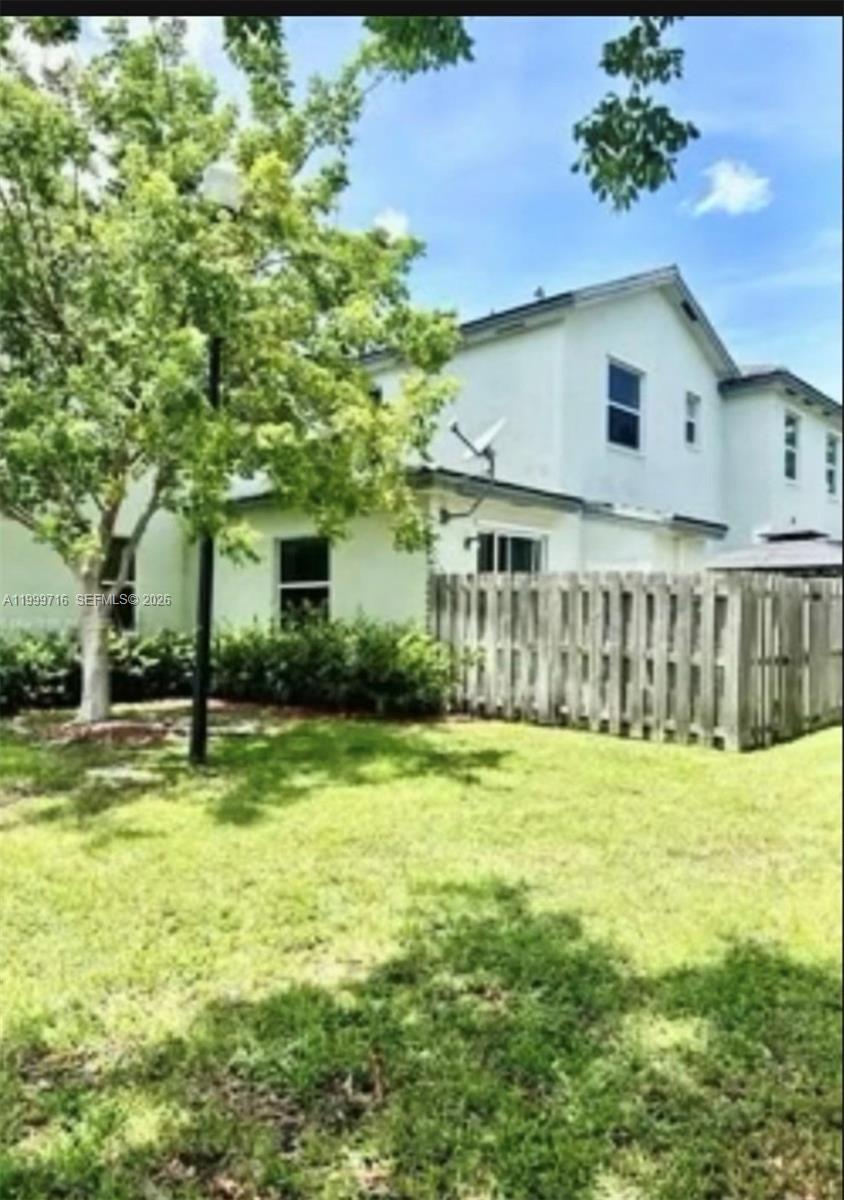 Attention investors!! Spacious and bright 3 bedrooms, each with its own full bathroom, 1 bedroom and full bathroom located on the 1st floor, featuring a large patio perfect for family gatherings. The beautiful kitchen has an island, ideal for quick breakfasts or family gatherings in the kitchen/living room area. The property is in great condition and conveniently located near everything. It includes stainless steel appliances and a tankless system for energy savings. Plenty of parking is available, and a clubhouse is just steps away, offering a yearly membership for the whole family. The seller is willing to contribute to closing costs at the selling price or adjust to the appraisal price if it's lower than the asking price. Come see this extremely beautiful place! also good for investment for its location not too far from the Florida Keys. Call Listing agent.