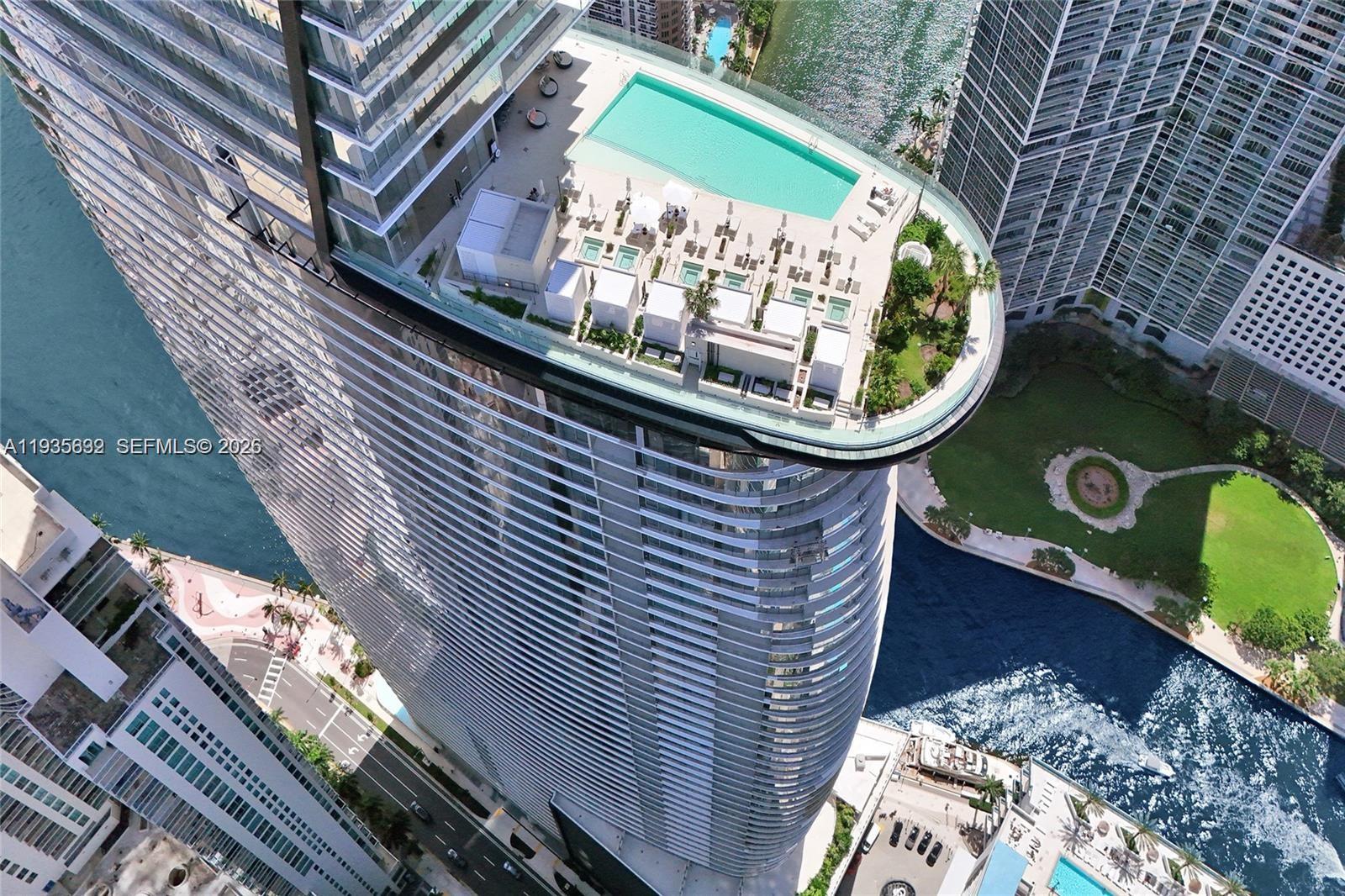 Welcome to Aston Martin Residences, where luxury meets sophistication in the heart of Downtown Miami. Perched on the highly sought-after line 04, Unit 3704 boasts 4 bedrooms, 5.5 bathrooms, and 3,560 sqft of pure elegance. Immerse yourself in breathtaking panoramic views framed by expansive floor-to-ceiling windows. The interiors are a masterpiece, adorned with Thassos marble floors and a gourmet kitchen featuring Gaggenau appliances. Indulge in over 40,000 sqft of world-class amenities: a two-story gym, spa, butler services, virtual golf, and serene pools. This is timeless luxury redefined.