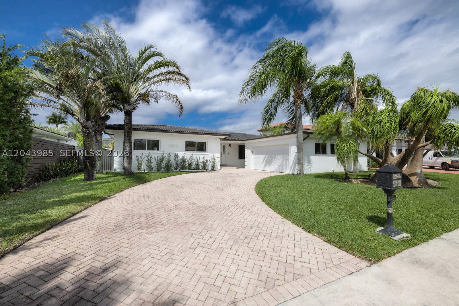 Live well in the coveted guard-gated enclave of Coronado Harbor in Keystone Point. This fully renovated single-story waterfront residence sits on 75 linear feet of canal frontage with direct Intracoastal and ocean access and zero fixed bridges, making it a true boater's paradise.

Originally built in 1957 and reimagined in 2017, the home offers 2,579 SF of open-concept living with large-format tile floors, floor-to-ceiling impact glass throughout, and a seamless indoor-outdoor flow that puts the water front and center. The chef's kitchen features granite counters, custom wood cabinetry, and a wraparound breakfast bar that anchors the great room.

Step outside to the covered patio with a built-in Argentinian parrilla grill, a massive pool surrounded by impact glass panels, a waterfront pergola lounge with fire pit and drapes, a private dock, and a dedicated cabana bath.

3 bedrooms, 3 full baths (one cabana bath), and a home office/breakfast nook with waterfront views complete the interior. Detached garage and a large paver driveway round out the package.

No HOA. Keystone Point Security Guard Special Taxing Assessment approximately $650/year. Minutes to Bal Harbour Shops, Aventura, and Miami Beach.