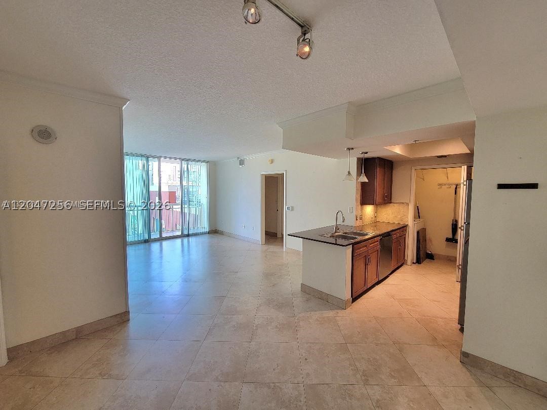 Perfect layout for a 2/1.5 with NE pool & palm garden views. Features all newer kitchen appliances & nice beige marble tiles allover. LOTS of CLOSET SPACE in this unit line. CITE is a popular condo community located directly on the bay and park. Walk to shopping, dining, public transportation. Close proximity to artsy Wynwood, world famous Design District, South Beach, Downtown, Brickell & all major highways. CITE features a large Technogym open daily 6am-10pm, tranquil beach-style pool & Jacuzzi, clubroom w/pool table, business lounge w/free laptops and internet. 24/7 front desk, valet and security. Cool retail such as restaurants, beauty parlor, UPS- Store, CitiBank and Dry Cleaner on premises. Located in hot East Edgewater - walk to shopping, dining, park! 2nd parking space $150/month.