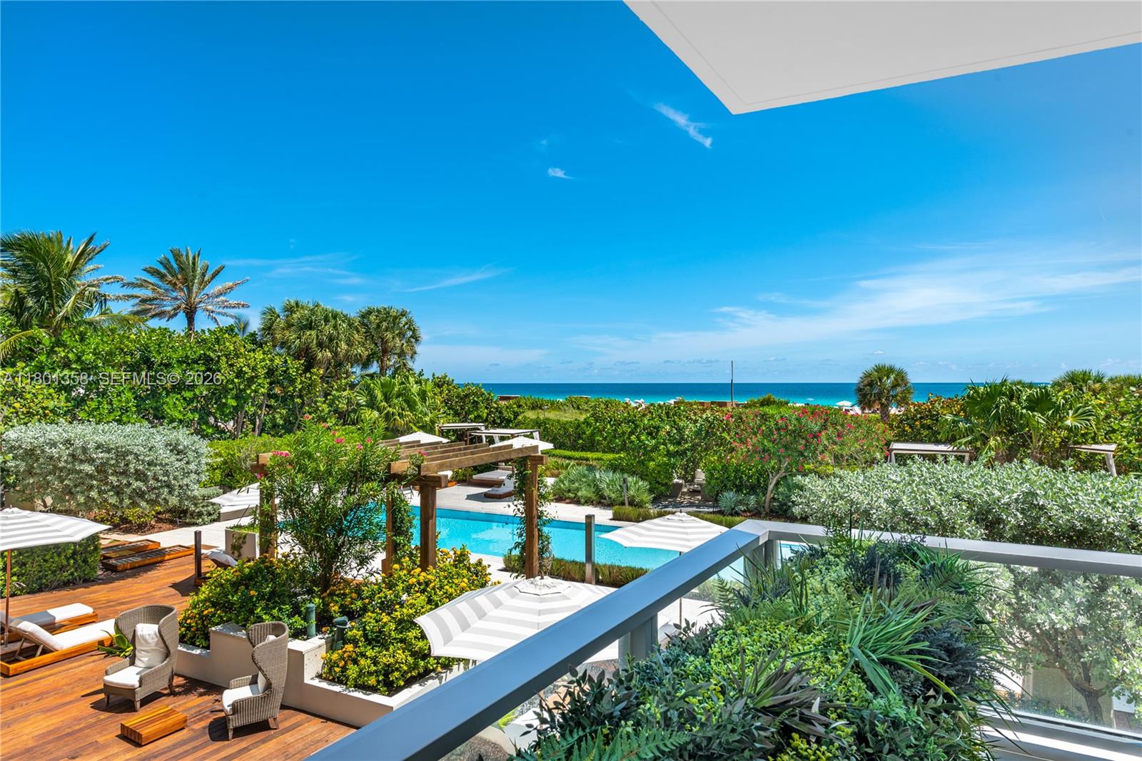 Another Collectable Property by the Jeff Miller Group! Set within the exclusive Ocean House in South of Fifth—Miami Beach’s most prestigious enclave of 28 homes—Beach House 203 is a rare 2-story residence offering 6,027 sq. ft. of thoughtfully designed living space. This 5-bedroom + maid’s suite home combines the privacy of a beachfront estate with the amenities of a five-star resort. Flooded with natural light, it is framed by floor-to-ceiling windows that reveal stunning ocean views and tropical foliage, with expansive living and entertaining areas, a gourmet kitchen, and a serene, oversized primary suite. Designed for both elegant entertaining and everyday comfort, with meticulous attention to detail and timeless finishes, this is South Beach living at its most refined.