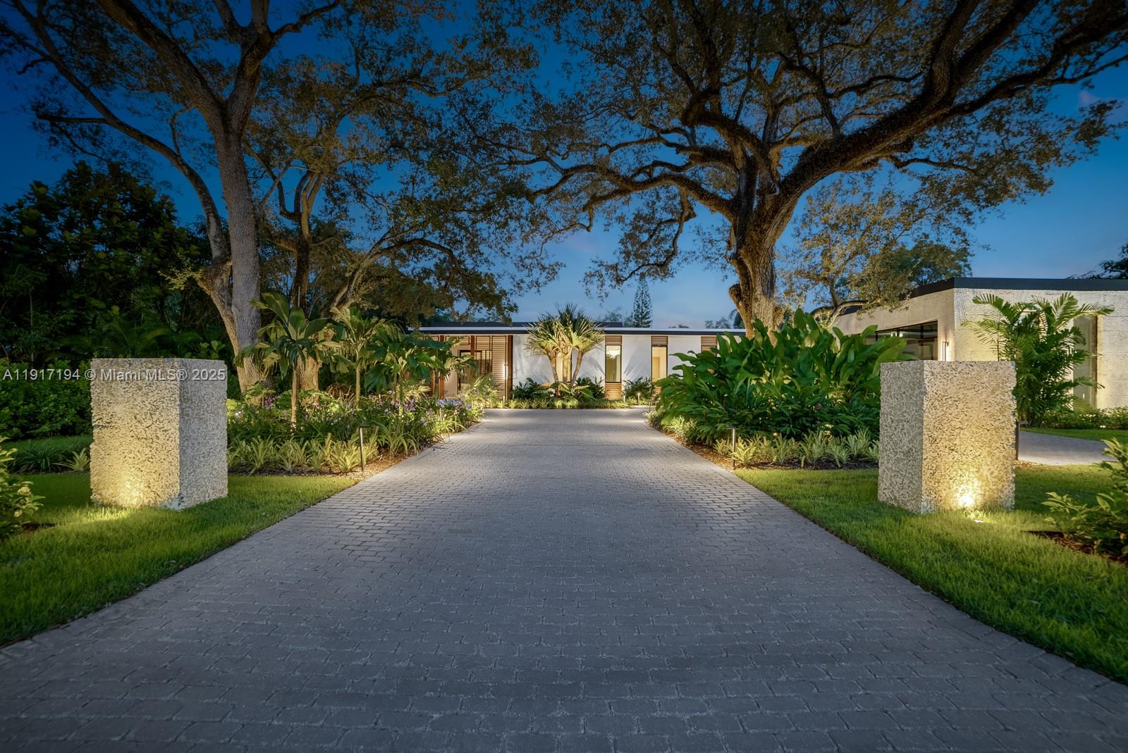 Brand New Construction,This Iconic South Miami residence defines modern luxury through sophisticated design & impeccable craftsmanship.A Resort-style sanctuary seamlessly blends indoor/outdoor living.Floor-to-ceiling glass throughout,white oak flooring,wine cellar & state-of-the-art kitchen sets the tone for elevated living.The Expansive primary suite showcases a wellness spa,complete w/full steam room,custom-built jacuzzi,hot/cold plunge,integrated TV/speakers w/private access to your own outdoor retreat.At the heart of this home lies a showstopping saltwater infinity pool,1,000sf summer kitchen;perfect for entertaining in style. Every element of this home was intentionally designed & executed to perfection;an architectural statement balancing innovation,comfort,& timeless sophistication