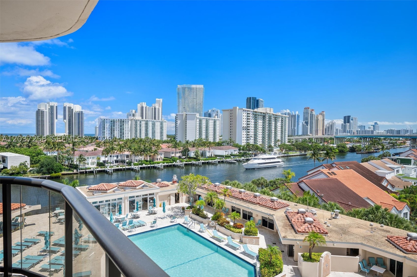 Wake up to breathtaking, unobstructed views in Turnberry Isle. From the moment you step inside this coveted line, your eyes are drawn to a panoramic backdrop of the shimmering Intracoastal, Atlantic Ocean, local marina, and the iconic Sunny Isles skyline. These vistas are perfectly framed by brand-new floor-to-ceiling impact windows and doors leading out to a sun-drenched, southeast-facing balcony—the ultimate spot to watch the yachts glide by.

This is a rare opportunity to secure the lowest-priced two-bedroom residence in the building. Spanning a generous 1,522 square feet, the home exudes sophisticated character with elegant wood-paneled ceilings in the living and dining areas. The oversized primary suite serves as a private sanctuary, complete with a custom walk-in closet and a spa-like bathroom featuring a jacuzzi tub.

Life here feels like a permanent vacation in a building that offers both luxury and peace of mind with fully funded reserves. Residents enjoy five-star amenities including 24-hour security, valet, and concierge services, along with a waterfront pool and snack bar, a state-of-the-art fitness center, and a full-service spa with a sauna and steam room.

The location is second to none, placing you moments away from pristine beaches, championship golf courses, world-class dining, and houses of worship. This level of luxury at this price point is unheard of in today’s market—act quickly to make this waterfront dream your reality.