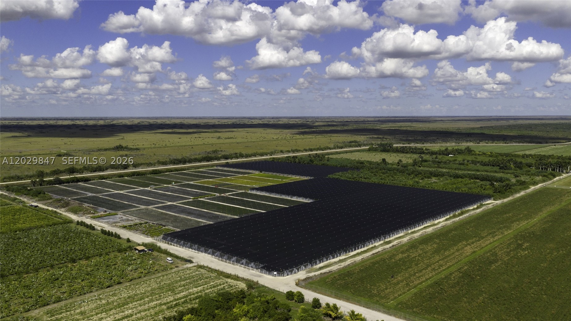 75± acres of improved agricultural land in Miami-Dade's Redland district, at SW 304th St & SW 217th Ave. Available as a whole or in two parcels (35 + 40 acres). Approximately $15,000/acre invested in shadehouse and irrigation; the entire site is irrigated. The 35-acre parcel retains its development rights; the 40-acre parcel's development rights were sold to the County. Production potential of roughly 350,000 10-inch pots, with approx. $2.1M gross income and $525K wholesale gross profit per year. Direct access from SW 304th St and SW 217th Ave, minutes from US-1 and Krome Ave. Suited for nursery, tropical fruit, or specialty crop operations. Buyer to verify zoning, development rights, and permitted uses with Miami-Dade County.