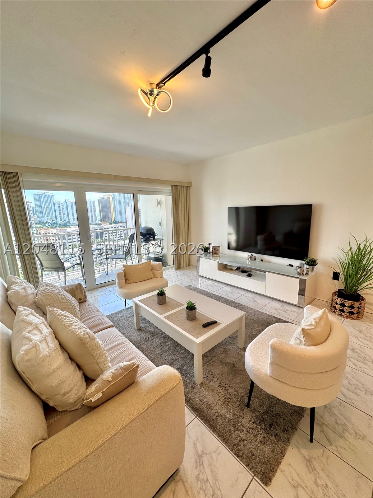 Beautiful residence located in one of Miami's most desirable coastal communities, just steps from the beach in Sunny Isles Beach. Situated on the 16th floor, this spacious unit offers breathtaking views of the city, the ocean, and the Intracoastal Waterway, perfect as a primary residence, vacation home, or seasonal retreat. Residents enjoy an exceptional lifestyle with resort-style amenities, including a heated pool, a fully equipped fitness center, two tennis courts, and more. Conveniently located near world-class shopping, dining, entertainment, and beaches. Experience South Florida living at its finest.