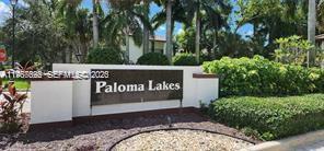 Paloma Lakes, Coconut Creek gated community, very Nice Corner Townhome featuring an open family room / dining room, a large kitchen with wood cabinets and granite counter tops 3 bedrooms, 3 full bathrooms and an Office/ Den that can be converted into a 4th bedroom. Great Prime location with top rated schools and the Promenade at Coconut Creek with premier shopping and dining nearby.