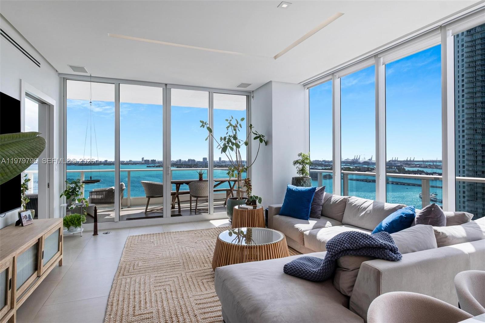 Stunning, fully renovated residence at  Paramount Bay, Featuring 3 bedrooms and 4 bathrooms with breathtaking panoramic views of Biscayne Bay and the Miami skyline, UNIQUE LAYOUT. This spacious unit has been completely upgraded with elegant Italian porcelain tile flooring throughout and modern recessed lighting that enhances the open living areas.
The residence features a sleek Italian-designed kitchen, perfect for both everyday living and entertaining. All bathrooms have been fully upgraded with modern finishes, high-quality materials. Additional upgrades include a brand-new A/C system and a new washer and dryer, offering comfort and efficiency, electric blackout and shades. Floor-to-ceiling windows fill the apartment with natural light while showcasing one of the best bay views in the city. Located in a prime Edgewater location directly across from Margaret Pace Park, this exceptional residence offers luxury living with convenience to Miami Beach, Brickell, and the Design District.
A rare opportunity to own a move-in-ready bayfront home with spectacular views in one of Miami’s most desirable neighborhoods