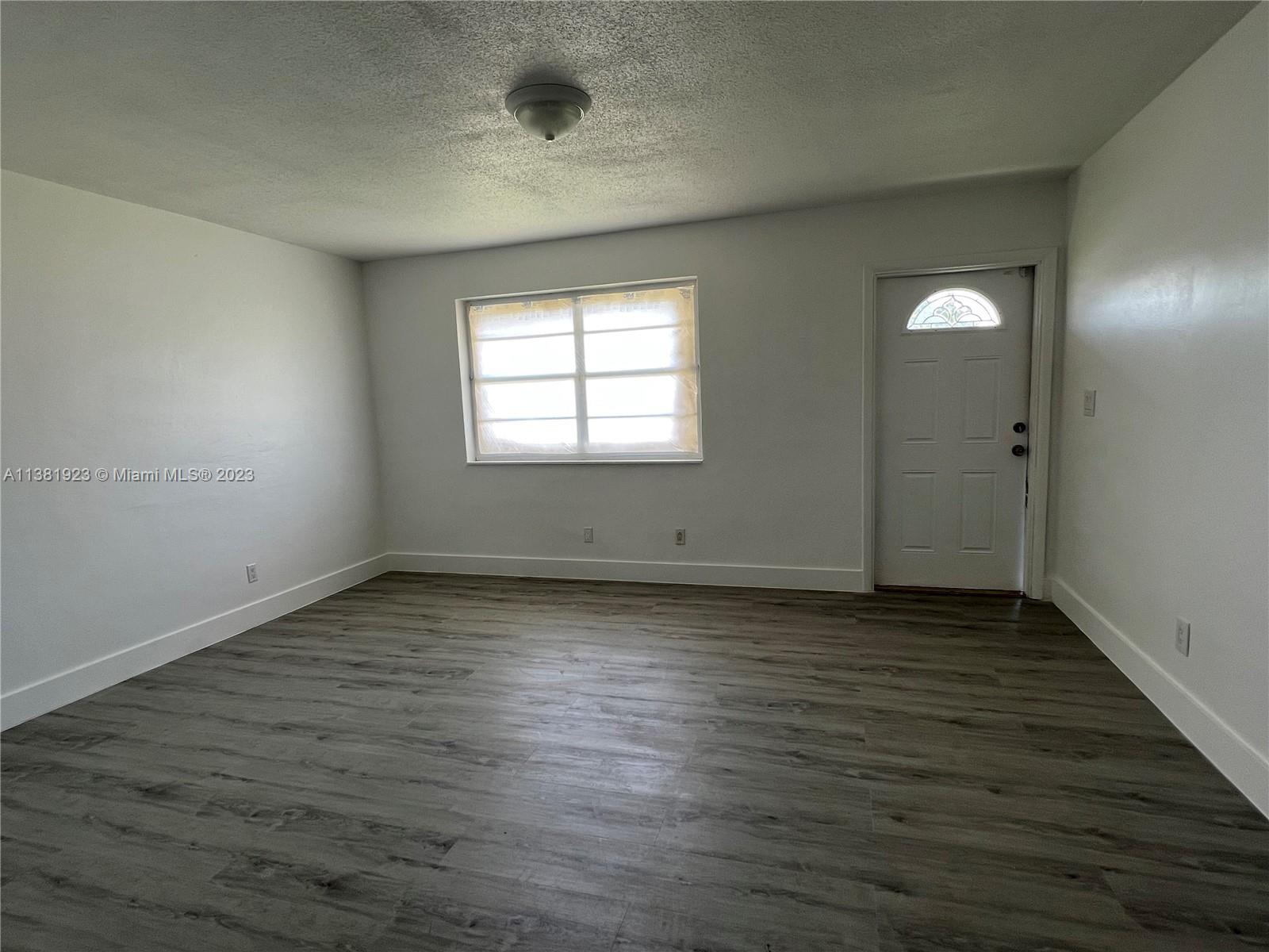 GREAT TWIN HOME......NEW KITCHEN, NEW WOOD FLOORING, UPDATED BATHROOM, PARTIAL NEW WINDOWS, NEWLY PAINTED, NEW AC DUCKS, AND NEW ROOF PENDING APPROVAL OF PERMIT.