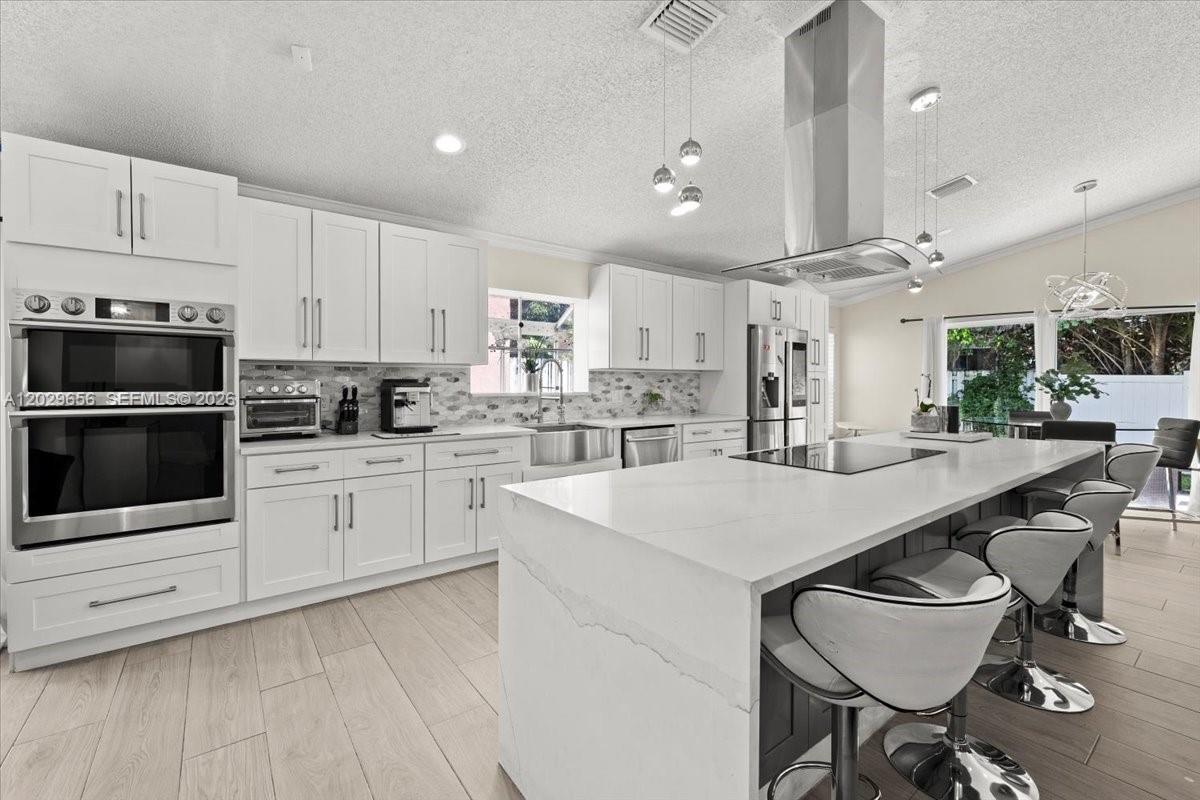 Modern elegance and comfort. Beautifully updated 3 bedroom, 2 bathroom single family home with a 2 car garage located in the highly desirable Chapel Trail community. This move-in ready home features an open concept floor plan and a remodeled gourmet kitchen with white cabinetry, quartz countertops, a center island cooktop, and smart stainless-steel appliances. Recent updates include a new roof, renovated bathrooms, and a new water heater. The spacious living areas offer abundant natural light and flow seamlessly to a private backyard, perfect for outdoor enjoyment and entertaining. Low HOA! Conveniently located near A rated schools, parks, shopping, dining, and major highways.