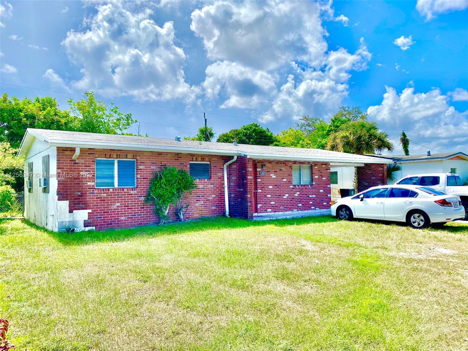 Brick front home with Carport and Fenced Backyard. Window AC in living room and all bedrooms, Ceiling fans in all the bedrooms, Tile and Linoleum floors, Room for Stackable washer & Dryer. New Water heater. Updated Kitchen.
No HOA, plenty of yard space. Very convenient location near Parks, beaches, stores, PBI Airport and Interstate, Perfect for investors or Airbnb.