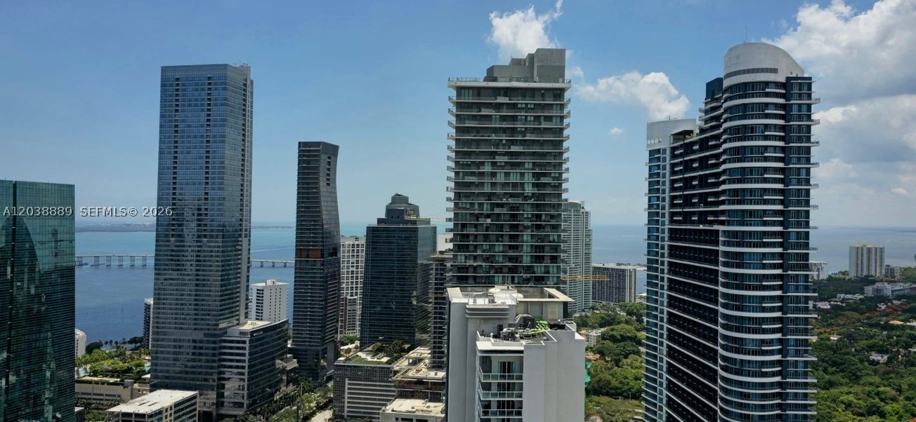 Millecento, a sought-after residence nestled in the heart of Brickell. This apartment offers finished interiors by  Pininfarina, providing ample space for relaxation and enjoyment. The open kitchen concept boasts stylish Italian cabinetry, making it ideal for entertaining guests. Washer & Dryer in the unit. Millecento boasts a rooftop, swimming pools, Club Citta lounge, pool table, movie theater, children’s facility, gym/yoga room, sauna, massage room, and business center.  on-site management, and complimentary valet parking. The location is simply stunning, steps away from the Brickell City Center, Mary Brickell Village, the Financial District, lounges, restaurants, & shops.  Short-term rentals are available. Occupancy available August 1st, 2026.