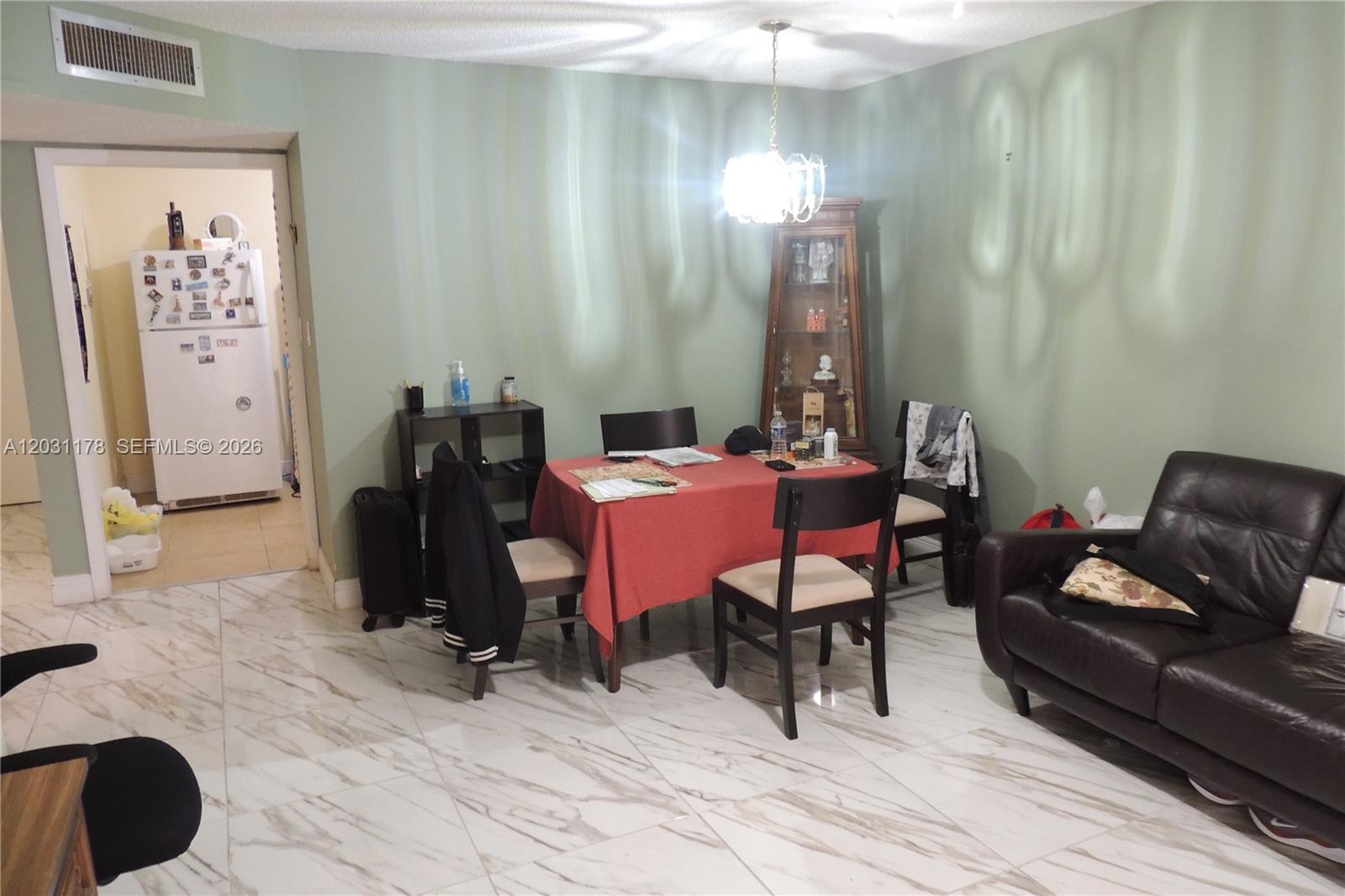 Spacious 1-bedroom, 1-bath condo located on the first floor in a desirable 55+ community in Lauderhill. Featuring two hallway entrances plus a private entrance from the parking area, this unit offers a spacious living room, separate dining area, and a screened-in patio perfect for relaxing.

Well maintained and ready for your personal touches, it presents a great opportunity to update and make it your own. Residents enjoy a clubhouse, pool, and a variety of community activities, all conveniently located near shopping, dining, and major roadways. Sold AS-IS. Great value and endless potential!