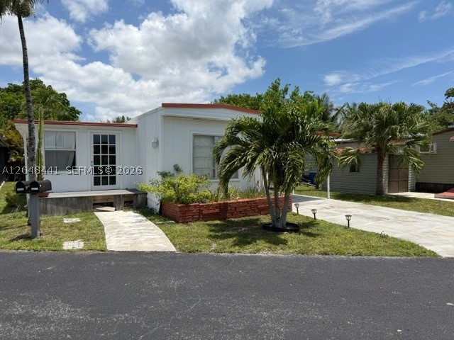 Great Opportunity to own this amazing 2/2 mobile home bath with an extra room and entrance for a possible efficiency. This great home offers laminated floors, nice bathrooms and showers. Kitchen and dining area is an Open concept. Hurry will not last, Land IS NOT included, Land fee is included in the HOA fees. 55+ community.