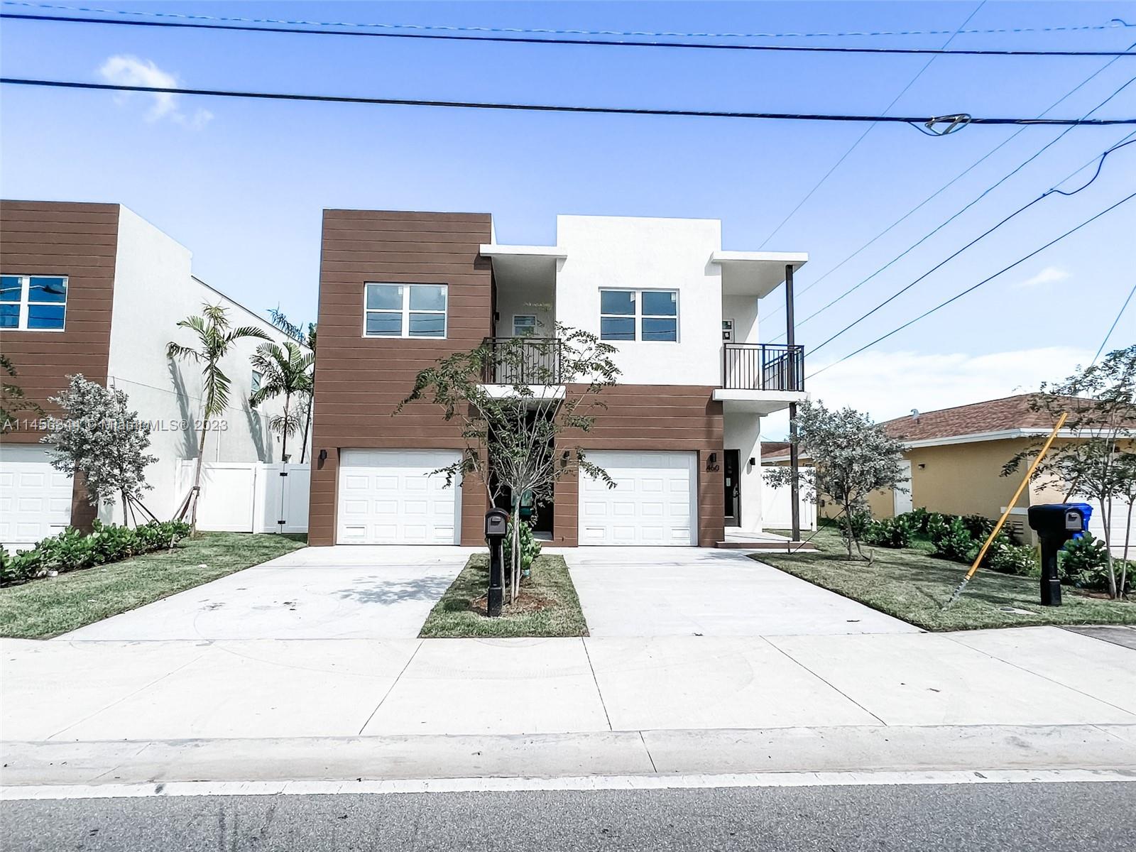 LAST ONE AVAILABLE! NEW CONSTRUCTION MODERN SINGLE-FAMILY TOWNHOUSE, 2 BDRMS / 2.5 BATH WITH 1 CAR GARAGE AND LOTS OF CURB APPEAL. TWO-STORIES, TALL CEILINGS, OPEN-CONCEPT FLOORPLAN, BEAUTIFUL MARBLE COUNTERTOPS AND ALL STAINLESS STEEL APPLIANCES, SPLIT BEDROOM LAYOUT, EACH BDRM HAS AN ON-SUITE BATHROOM & BALCONY, UPSTAIRS LAUNDRY ROOM WITH STKBL MACHINES, NEW AC UNIT AND TANKLESS WATER HEATER ARE POWERFUL AND EFFICIENT, PRIVATE SPACIOUS BACKYARD, GORGEOUS LANDSCAPING, AUTOMATIC SPRINKLER SYSTEM, IMPACT WINDOWS AND DOORS, ELECTRIC VEHICLE CHARGING OUTLET IN GARAGE. LESS THAN 5 MINUTES FROM I-95 AND TURNPIKE. CLOSE TO WALMART, PUBLIX, SHOPPING, CASINO ECT FEE-SIMPLE AKA SEPARATE UTILITIES, CITY WATER, CITY SEWER, CITY GARBAGE, FPL, COMCAST/AT&T, AND SEPARATE ROOFS. NO HOA.