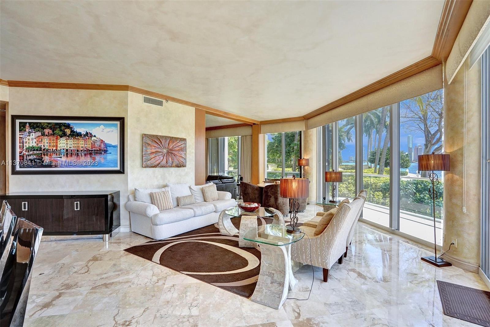 AMAZING OPPORTUNITY TO LIVE IN THE EXCLUSIVE RESIDENCE DU CAP BUILDING AT WILLIAMS ISLAND.  THIS UNIQUE GROUND FLOOR UNIT OFFERS DIRECT ACCESS OUTSIDE TO THE WATERS EDGE, TRULY LIKE LIVING IN A PRIVATE HOME.  ENJOY THIS 3 BEDROOM/ 3 BATH HOME FEATURING HIGH CEILINGS, MARBLE FLOORS, OVERSIZED WALK-IN CLOSETS, LARGE WRAP-AROUND TERRACE, SPACIOUS KITCHEN.  LIVE IN PRESTIGIOUS WILLIAMS ISLAND WITH FULL AMENITIES:LIVE IN PRESTIGIOUS WILLIAMS ISLAND WITH FULL AMENITIES:  14 TENNIS COURTS, 4 PICKLE BALL COURTS, 2 PADEL COURTS, 3 RESTAURANTS, STATE OF THE ART SPA, MARINA, WALK/JOG PATH, KIDS PLAYGROUND, BASKETBALL COURT, SOCCER FIELD, PUTTING GREEN, COURTESY BUS, PLUS GOURMET SUNDRY COFFEE/GELATO SHOP, AND SO MUCH MORE....