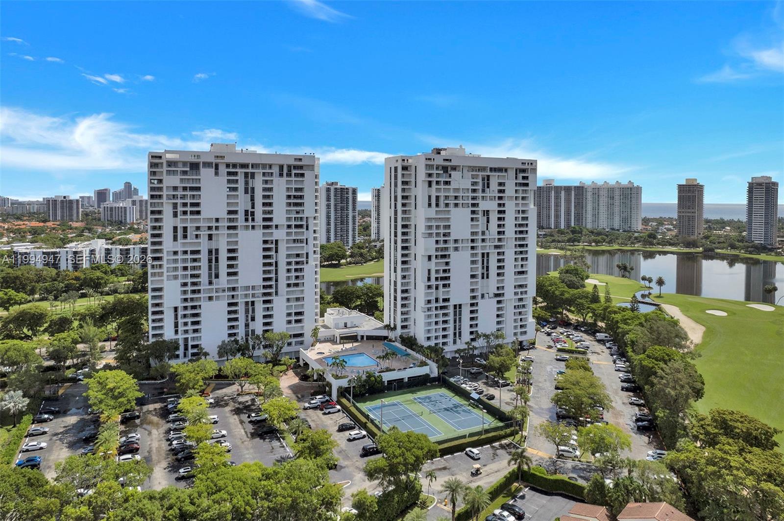Price improvement alert! Welcome to this beautifully updated 2-bedroom, 2-bathroom condominium in the highly desirable Delvista Towers, offering breathtaking views of the lake and golf course, abundant natural light, and a clean, modern design. The spacious primary suite features a private balcony and four closets, including a walk-in closet. The unit has been freshly painted and showcases new flooring throughout, along with a brand-new Bosch A/C system. The kitchen is equipped with new stainless steel appliances, making this home truly move-in ready. Enjoy an array of amenities, including a 24-hour gated entrance, heated pool, sauna, Jacuzzi, fitness center, tennis courts, sauna, valet parking, and more. Complimentary Wi-Fi is available in the common areas. Ideally located just minutes from premier shopping, dining, and entertainment at Aventura Mall, Gulfstream Park, and the beach, this property offers exceptional convenience and lifestyle.