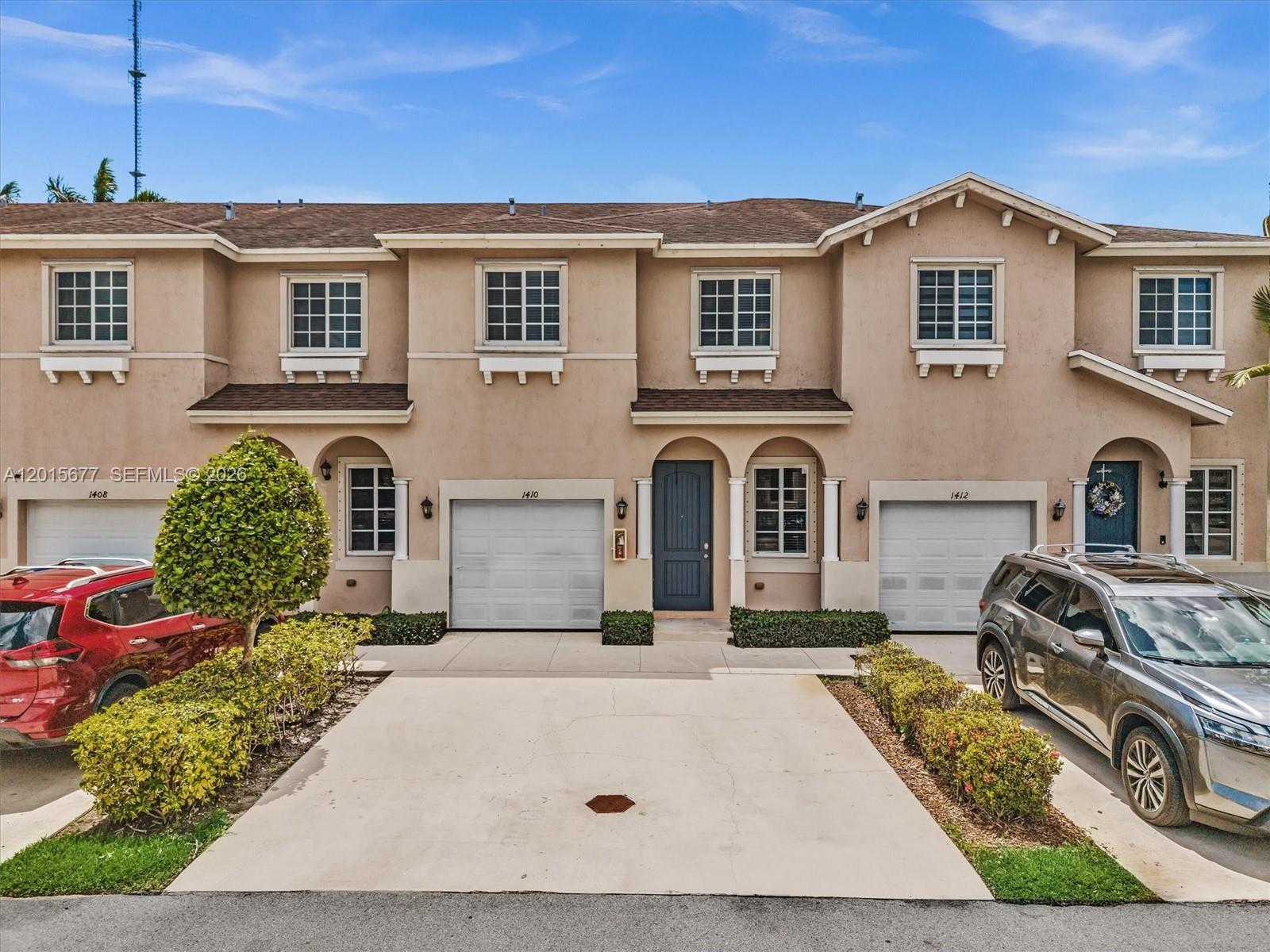 STOP! If a spacious 3-bedroom, 2.5-bath home in the heartbeat of Miami is your dream, don’t scroll past this one! Located in the desirable Walden Townhomes, this modern almost 1,600 sq. ft. residence offers the perfect blend of style and convenience.

The bright, open-concept layout features high ceilings, a chef’s kitchen with stainless steel appliances, and tile flooring throughout the main level. Laminate flooring covers the 2nd level, where the bedrooms and laundry room are conveniently located. The property features blinds throughout. Enjoy the rare luxury of a 1-car garage plus 2 additional driveway spaces.

Situated in a prime location just minutes from Hard Rock Stadium, Topgolf, and premier shopping, there's quick access to the Florida’s Turnpike and I-95 for an easy commute to Miami or Ft. Lauderdale. Residents enjoy a sparkling community pool, low HOA fees, and lush landscaping. This move-in-ready gem is the ultimate find for first-time buyers or investors. 

Schedule your showing today!