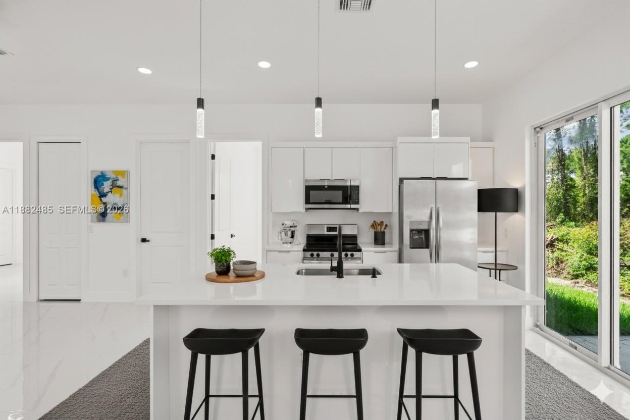 **SELLER WILLING TO HELP BUYERS WITH CLOSING COSTS CONCESSIONS**Come and visit this new construction in Lehigh Acres. Beautiful brand new home featuring impact windows and doors, elegant glass shower doors, modern ceiling fans with lights, and high ceiling that create a spacious and. bright atmosphere. The kitchen boats quartz countertops, sleek cabinetry, and a stylish open layout perfect for entertaining family and friends. Close to 82 ave. 1.1 from Aldi. 
Seller also owns adjacent parcels that may be available for separate purchase. Don't miss the opportunity to expand your investment. Buyer or agent should verify availability and terms directly with the seller.
. Don't miss this opportunity to own a move in ready new construction in a growing community.
