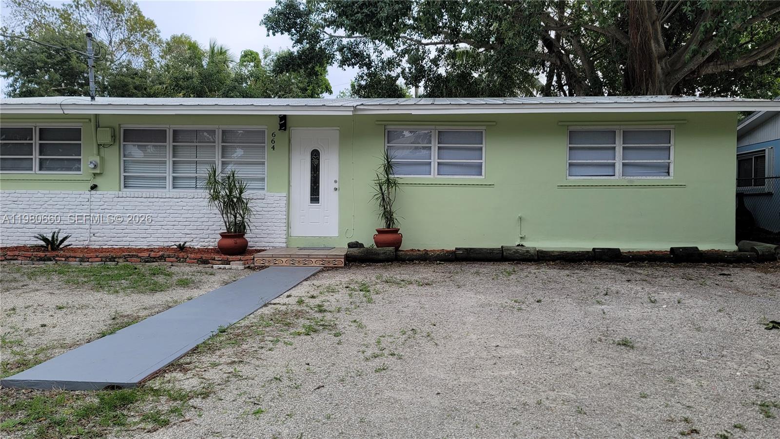 Opportunity to own a 4-bedroom, 2-bath single-family home in the desirable Twin Lakes area of Key Largo. This property offers approximately 1,314 sq ft of living space and sits on a 6,390 sq ft lot with plenty of room for boats, RVs, or multiple vehicles. The spacious yard provides a great outdoor setting with garden views and potential to create your ideal Keys retreat. Whether you're looking for a primary residence, vacation getaway, or investment property, this home offers flexibility and value in one of the most sought-after areas of the Florida Keys. Conveniently located near marinas, parks, restaurants, and world-class fishing and boating.