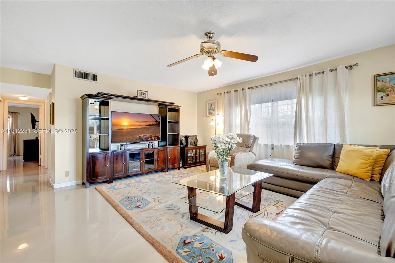 Low maintenance! Amazing unit in a great area, close to Downtown Hollywood, Aventura Mall, beaches, major highways, restaurants and entertainment. Just a lovely corner unit, with luring updates, all porcelain floors, newer A/C unit and water heater. Impact windows! Perfect getaway beach home or full time residence. Very well suited for investors as well, it can be rented immediately after 1 year of ownership. No short terms, no Airbnb. Assigned parking space. An all ages building. Come and enjoy the lush vegetation and many parks throughout the neighborhood!