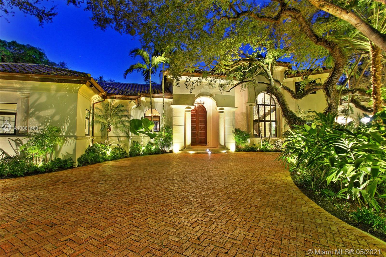 Located in the gated Snapper Creek Lakes community this amazing 2-story estate sits on a 45,430 SF lot surrounded by a mature oak canopy. The remodeled 6BR/8+1BA home offers 9,807 SF (total area under roof as per building specs) & includes a separate 2BR/2BA guest suite. Spacious living room w/fireplace, private dining area, a bar w/256-bottle glass wine display, natural stone finishes, family room & movie theater. The open gourmet kitchen sports eat-in marble center island, custom cabinetry & top-of-the-line Wolf, Sub-Zero & Miele appliances. 2nd floor principal suite features marble floors, private balcony overlooks the pool & Carrara marble bathroom w/steam & rain shower w/sunken spa tub. Resort-style outdoor areas include pool w/waterfall & hot tub, lush landscaping & private fire pit.
