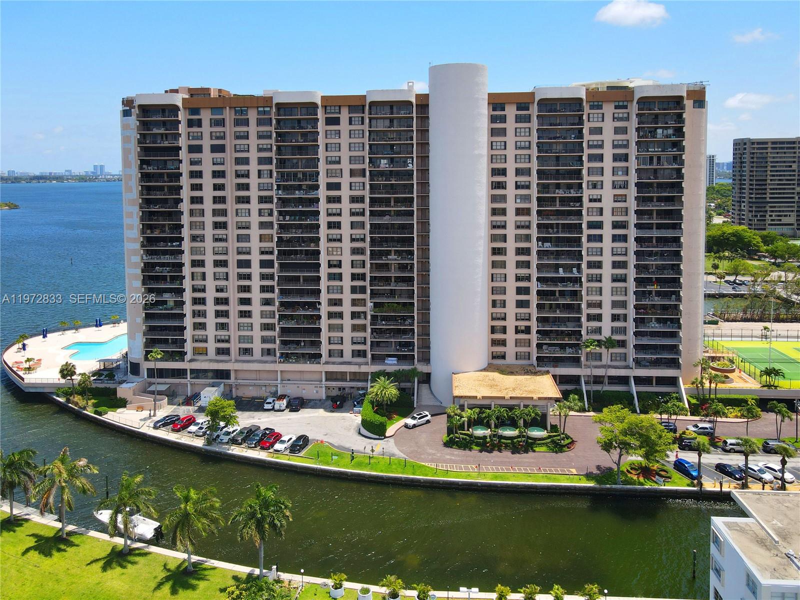 Gorgeous 2 BR & 3 BA unit at The Cricket Club! Features incl. a spacious floor plan w/ lots of natural light, custom gourmet kitchen w/ new appliances, private master suite with HIS & HERS bathrooms + 2 separate walk-inclosets, porcelain tile & marble floors throughout & new AC. With an exquisite 35' long balcony that is like an outdoor living/dining room & fabulous views, this is the perfect place to entertain or to host a nice family gathering! Additional features include WASHER + DRYER in-unit, lots of closet space and a storage unit. Building amenities include a resort-style pool, gym, 24 hour doorman + bellman, valet, lobby bar, children’s playground +tennis & basketball courts. Conveniently located within a 10 MIN DRIVE FROM THE BEACH & near all the local shops + restaurants.