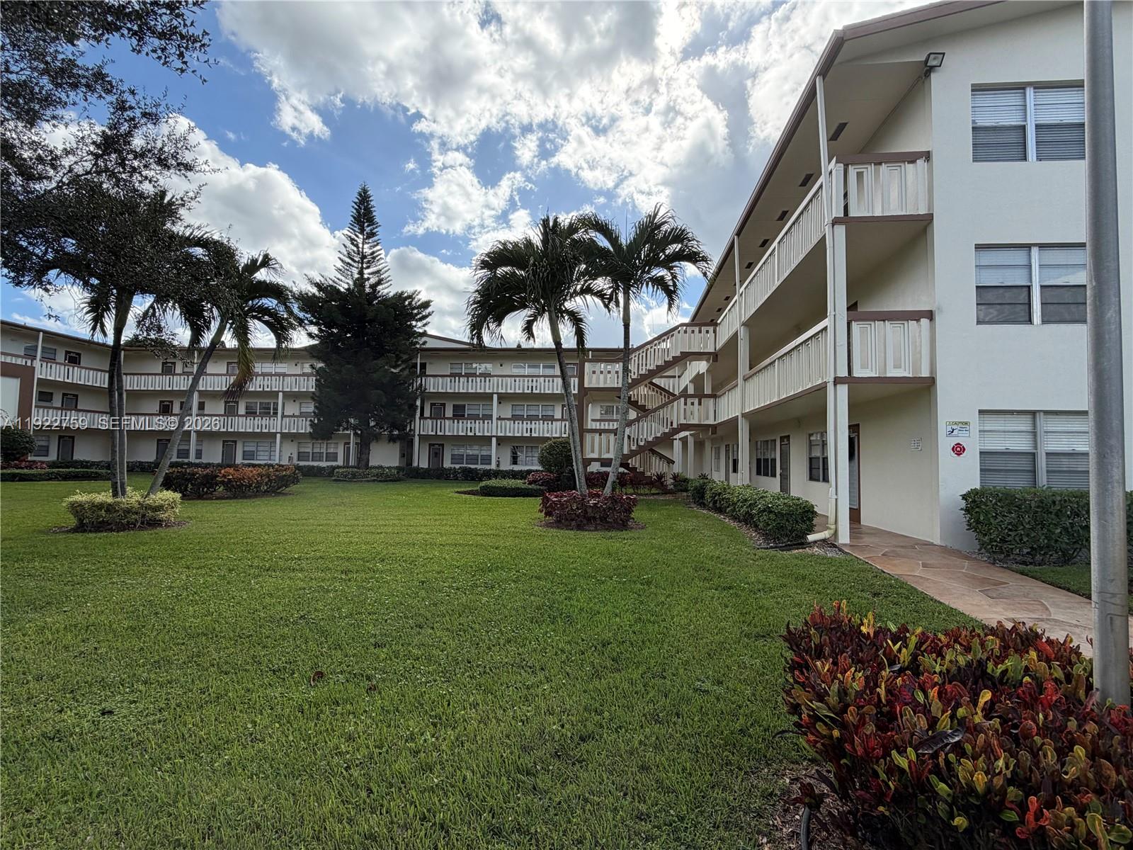 Resort-style living at an affordable price! This 2-bedroom, 1.5-bath 1st floor corner unit offers extra windows for natural light and the convenience of no stairs or elevators. Located in Century Village – Boca Raton, a 55+ active adult community, residents enjoy a 125,000 sq ft clubhouse with a 1,250-seat theater, full fitness center, billiards, arts & crafts studio, party room, catering kitchen, and numerous activity rooms. A full-time activities director ensures there’s always something to do. Outdoors, enjoy lakes, walking paths, tennis, bocce ball, shuffleboard, and 13 satellite pools. Basic cable and internet included. Annual rental only. No pets. Unit is in good condition and ready for immediate occupancy.